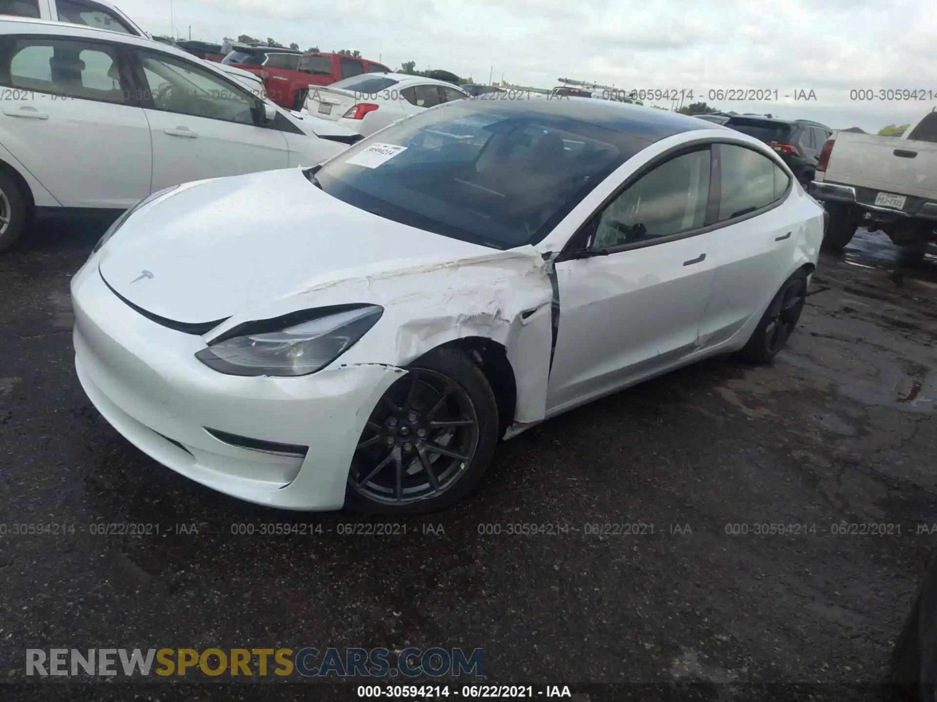 2 Photograph of a damaged car 5YJ3E1EB4MF983433 TESLA MODEL 3 2021