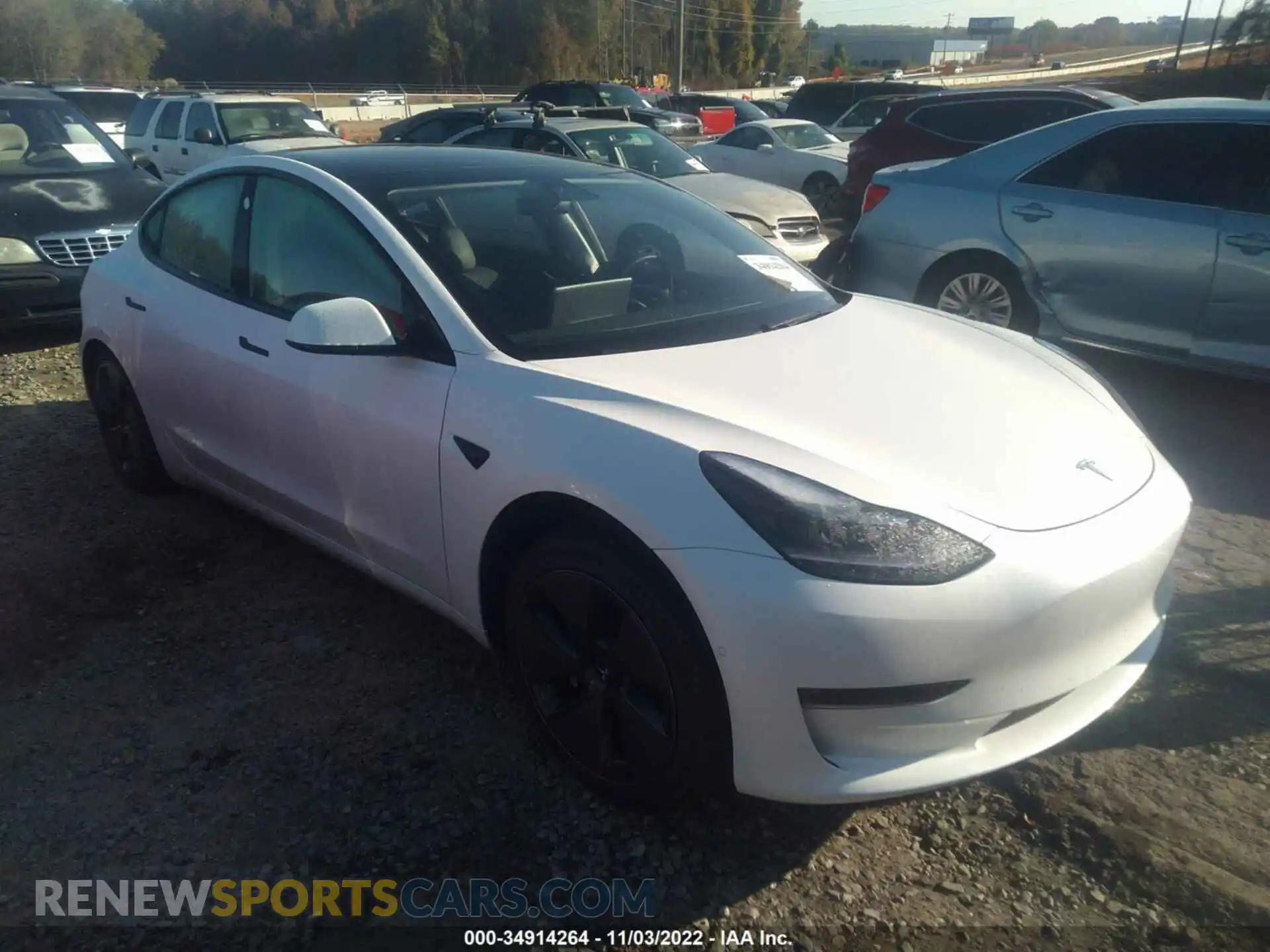 1 Photograph of a damaged car 5YJ3E1EB4MF988308 TESLA MODEL 3 2021