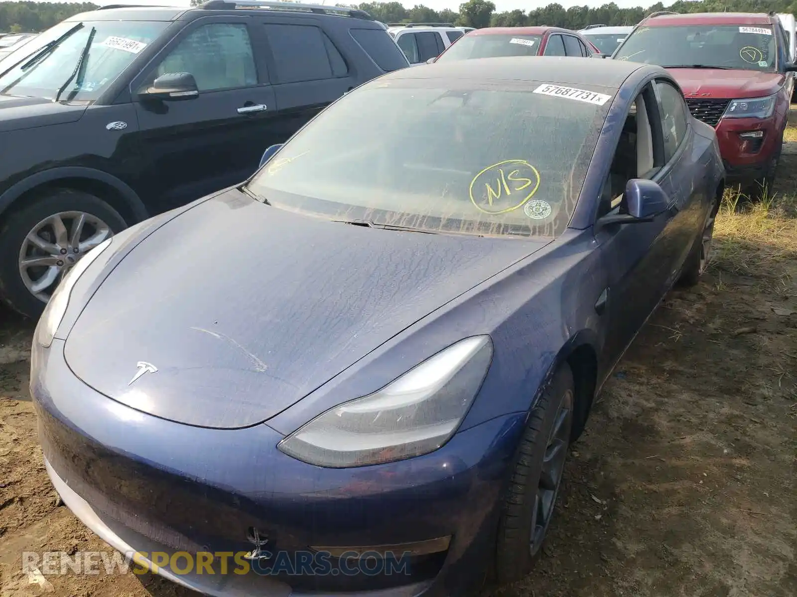 2 Photograph of a damaged car 5YJ3E1EB4MF992701 TESLA MODEL 3 2021