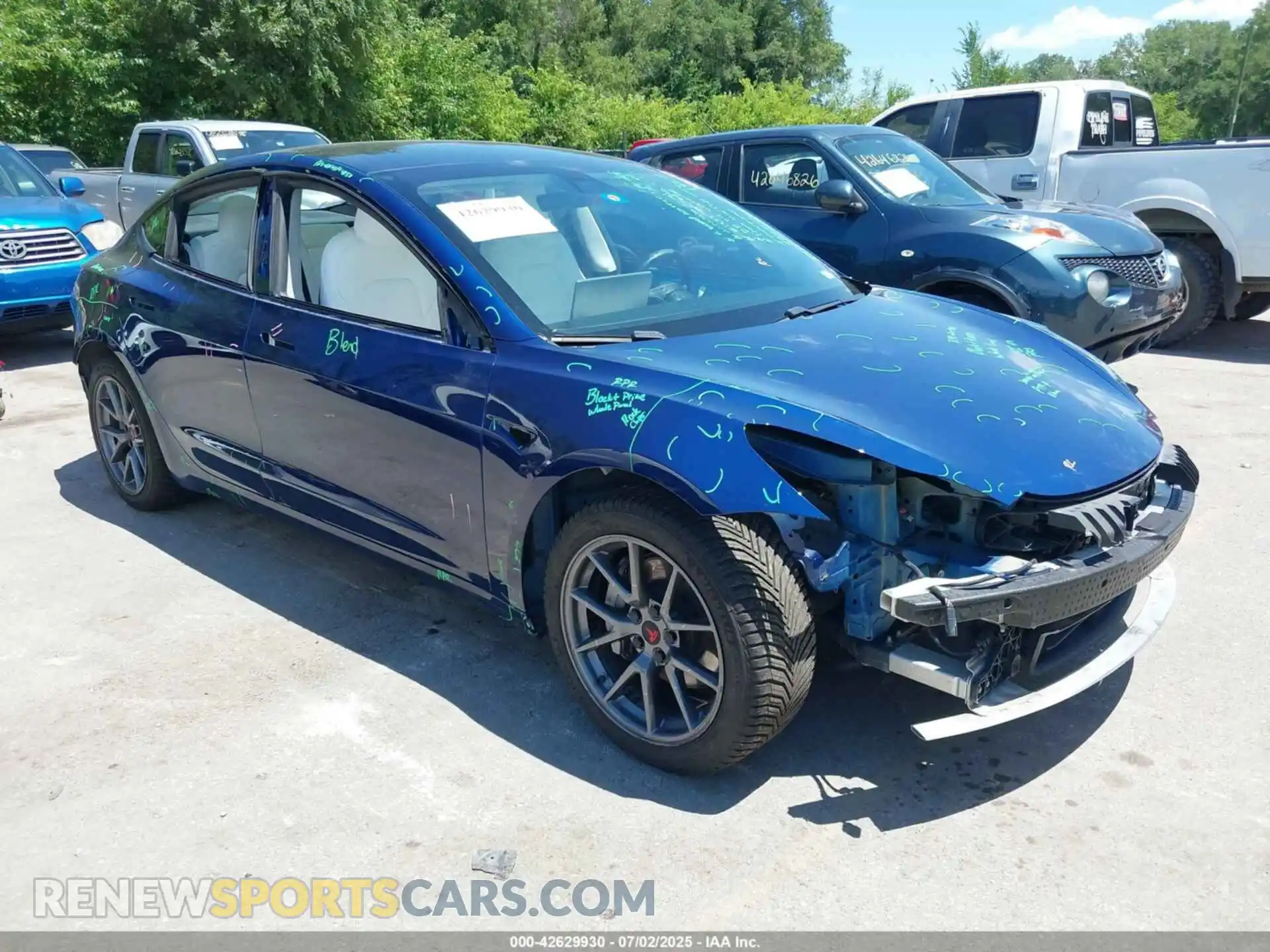 1 Photograph of a damaged car 5YJ3E1EB4MF992925 TESLA MODEL 3 2021