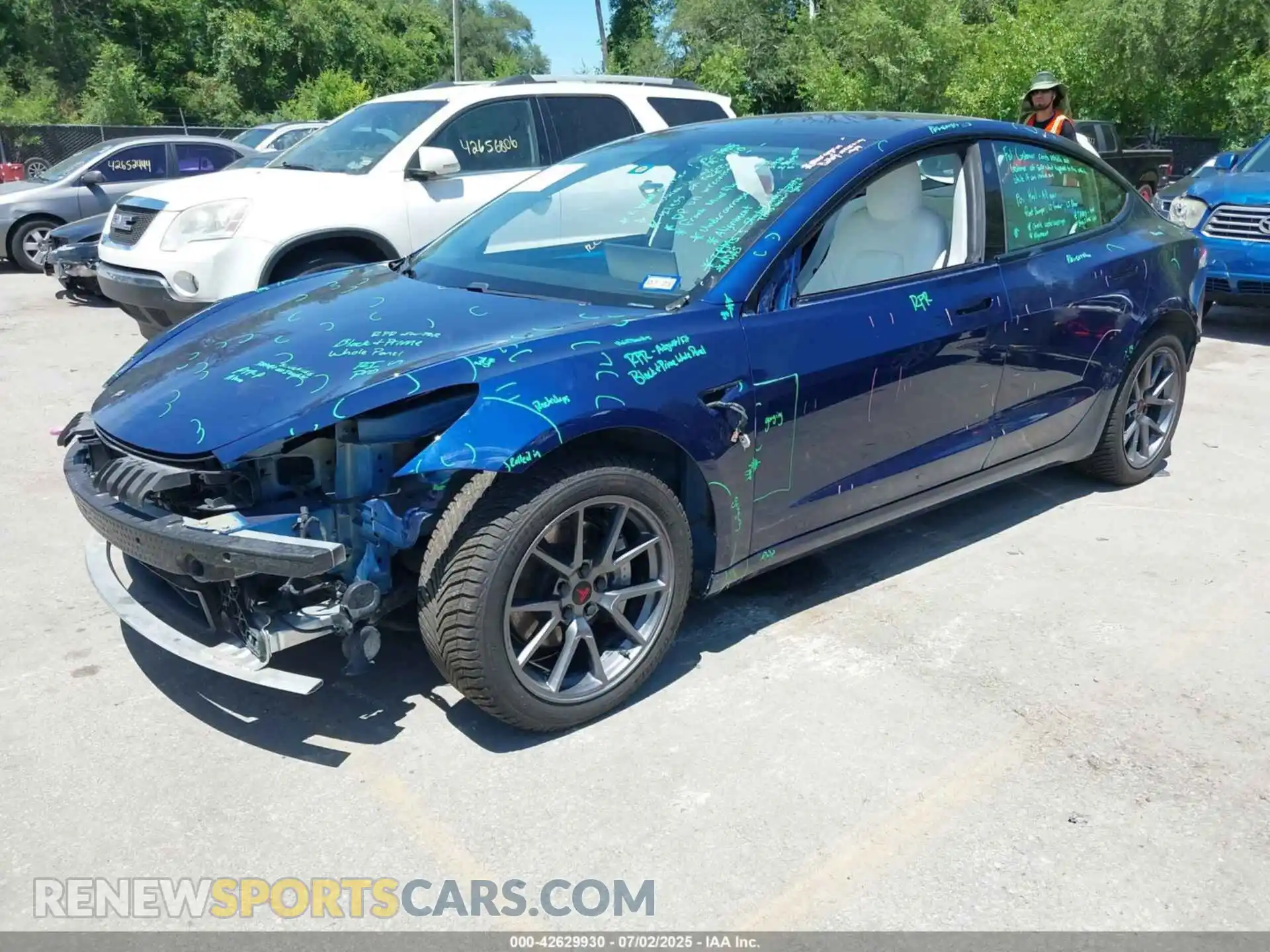 2 Photograph of a damaged car 5YJ3E1EB4MF992925 TESLA MODEL 3 2021