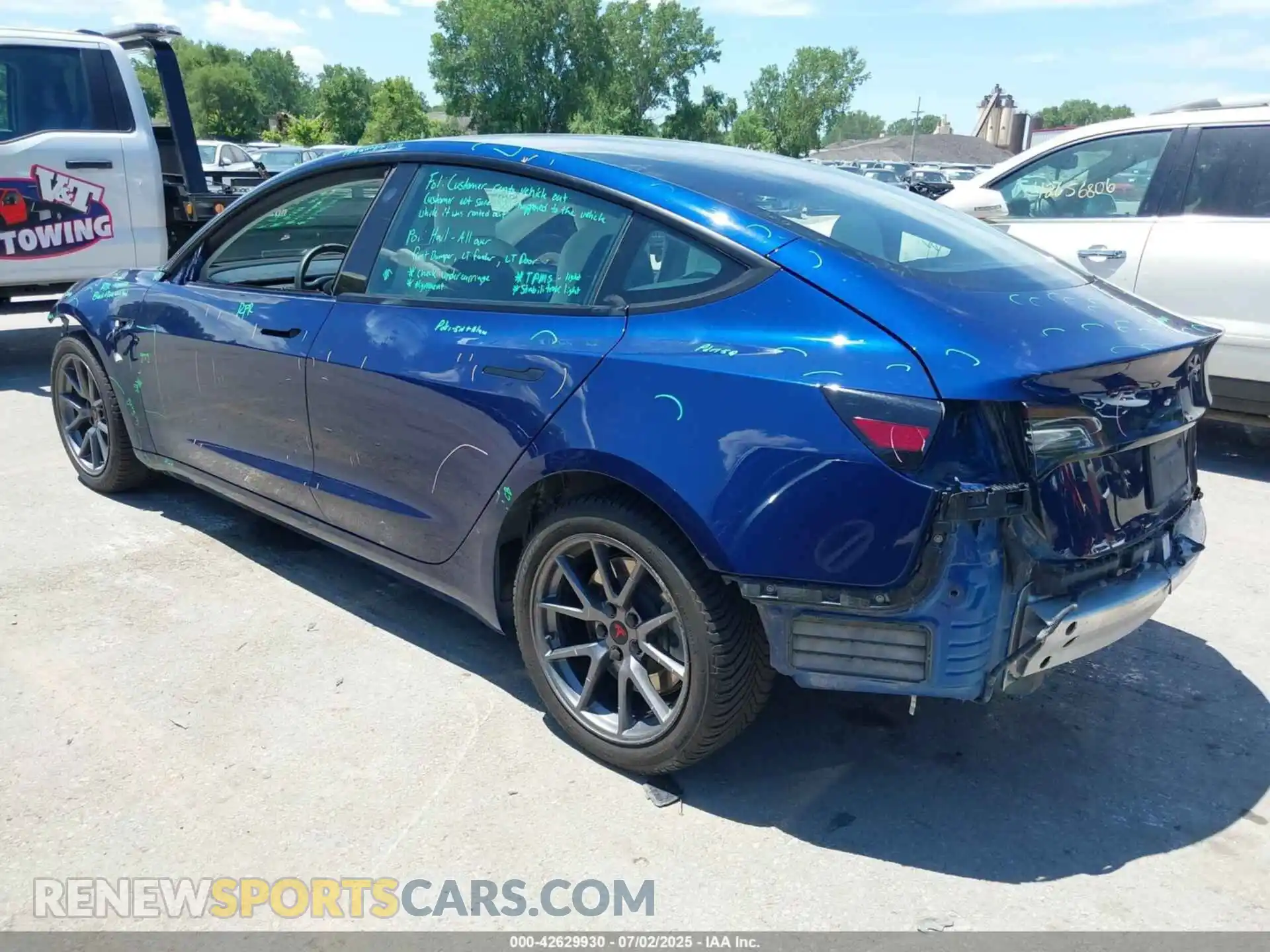 3 Photograph of a damaged car 5YJ3E1EB4MF992925 TESLA MODEL 3 2021