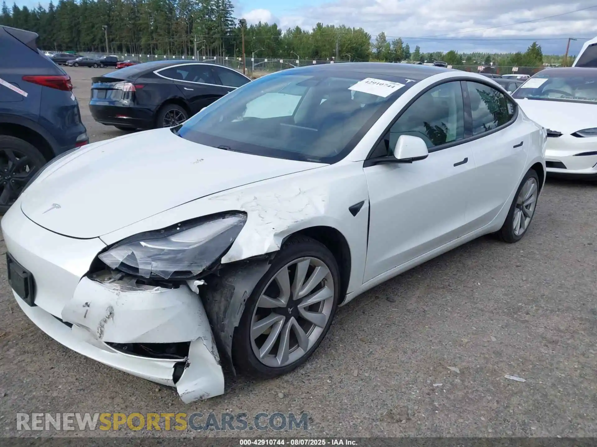 2 Photograph of a damaged car 5YJ3E1EB4MF997431 TESLA MODEL 3 2021