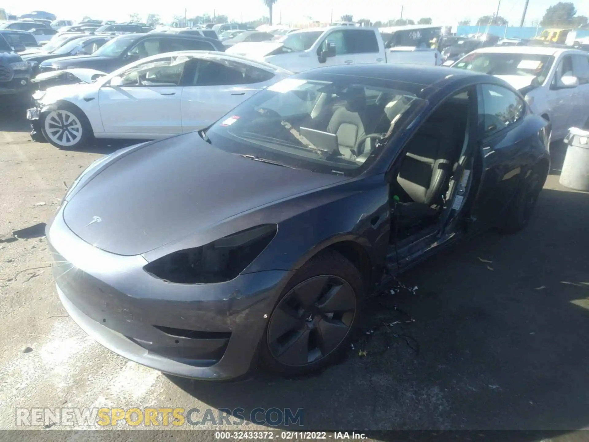 2 fotografías del automóvil dañado 5YJ3E1EB5MF006799 TESLA MODEL 3 2021