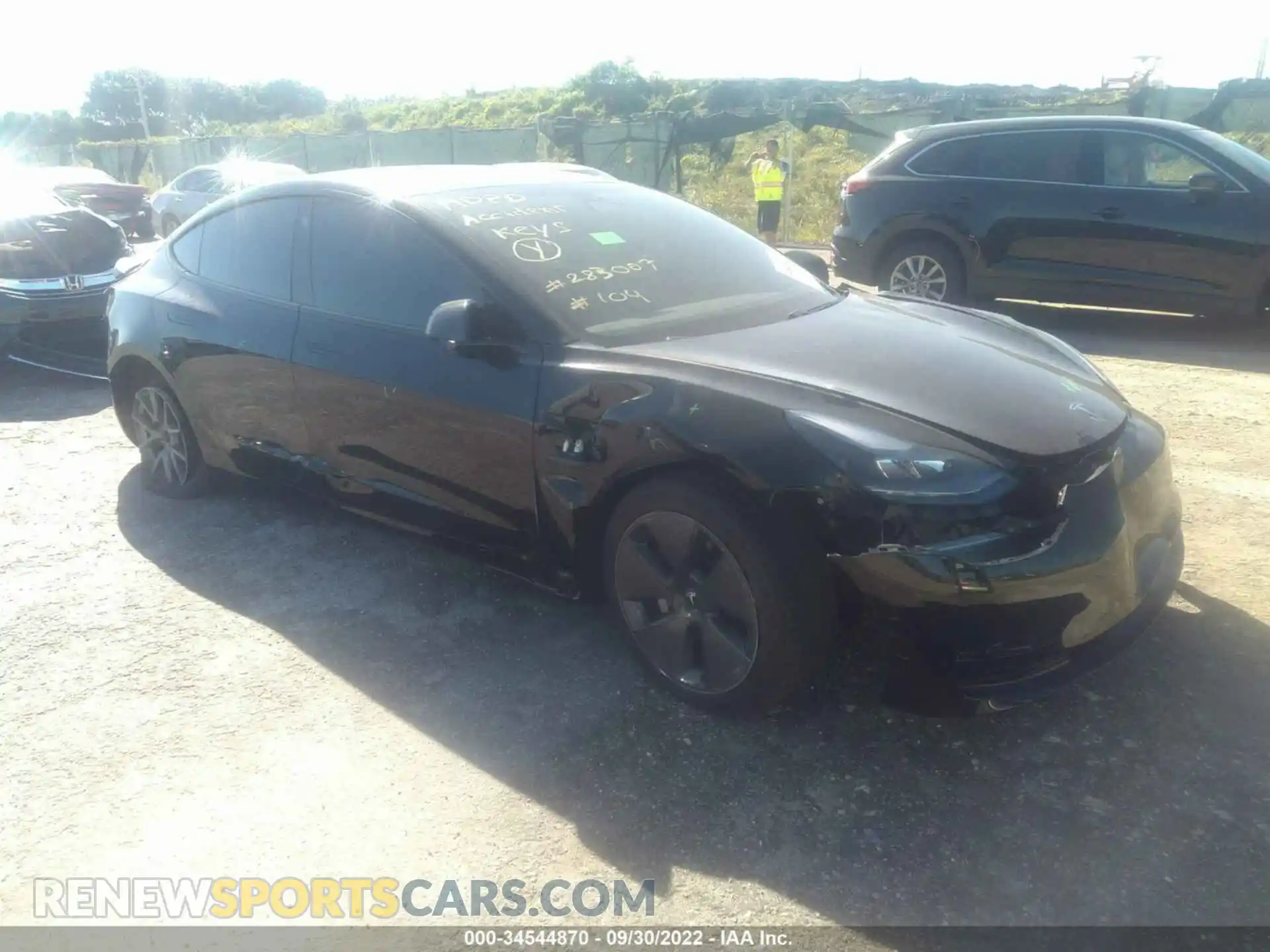 1 Photograph of a damaged car 5YJ3E1EB5MF064072 TESLA MODEL 3 2021