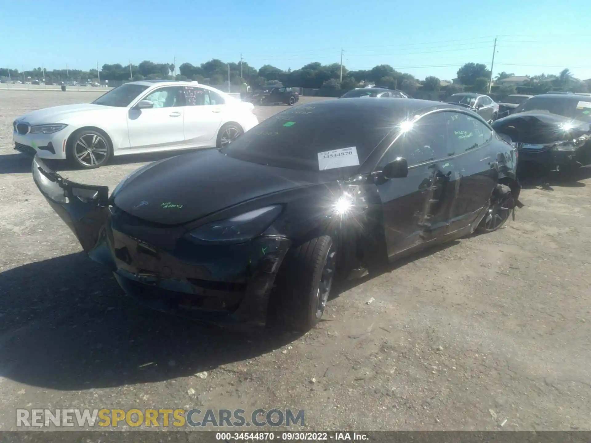 2 Photograph of a damaged car 5YJ3E1EB5MF064072 TESLA MODEL 3 2021