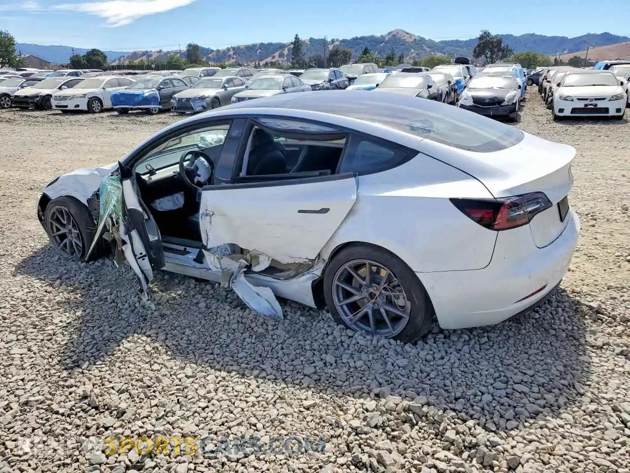2 fotografías del automóvil dañado 5YJ3E1EB5MF072656 TESLA MODEL 3 2021