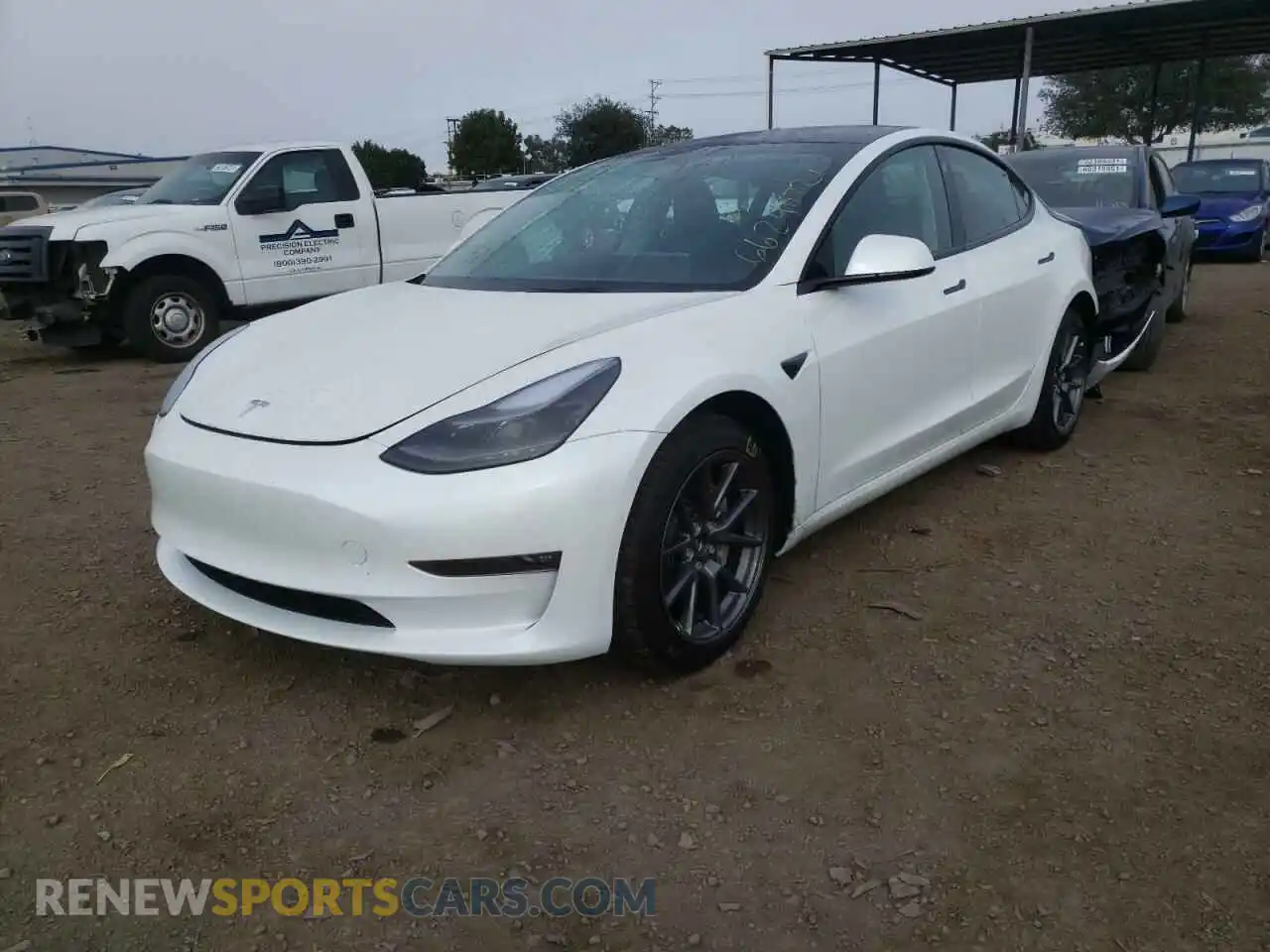 2 fotografías del automóvil dañado 5YJ3E1EB5MF085858 TESLA MODEL 3 2021