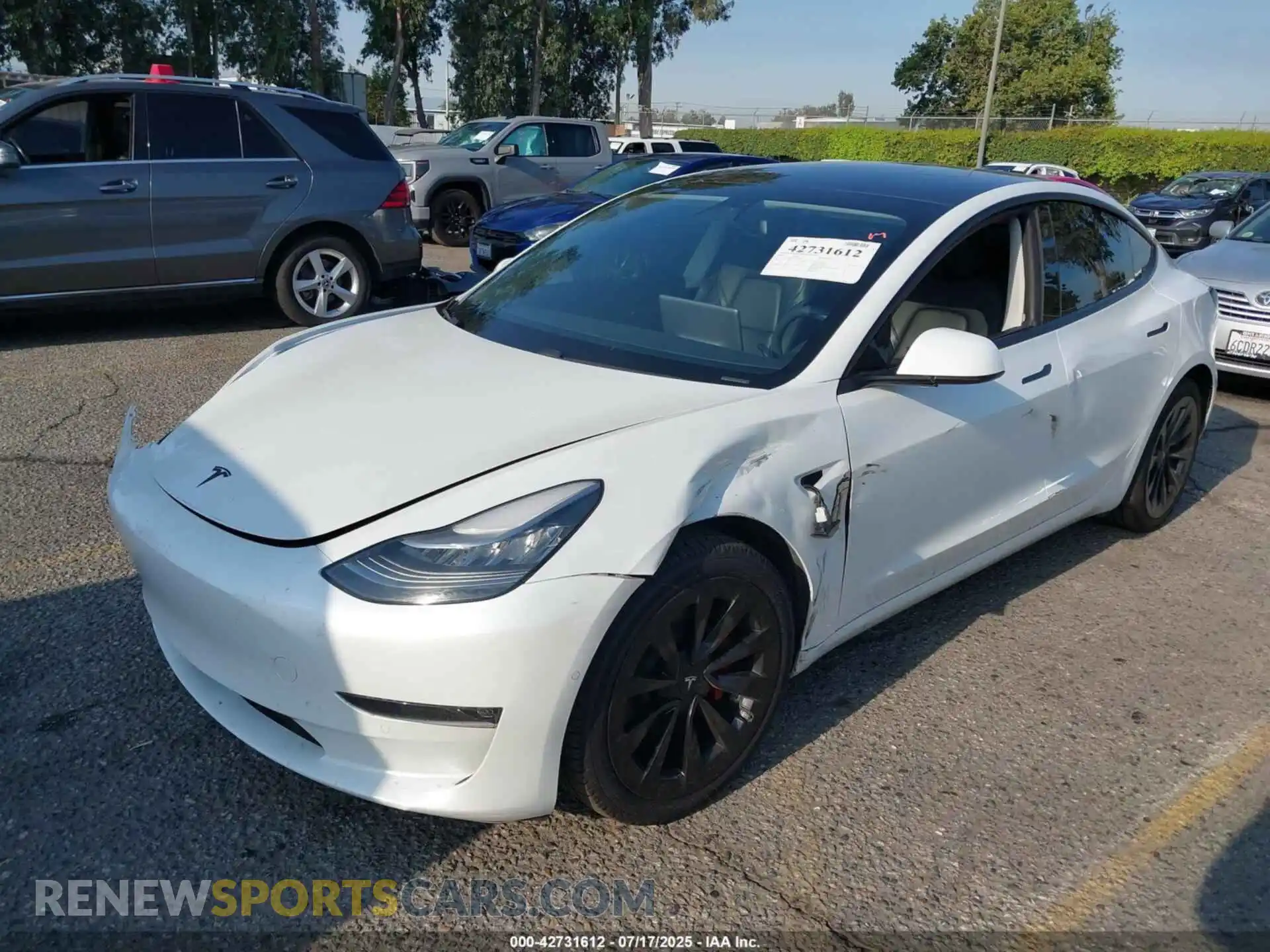 2 Photograph of a damaged car 5YJ3E1EB5MF859865 TESLA MODEL 3 2021