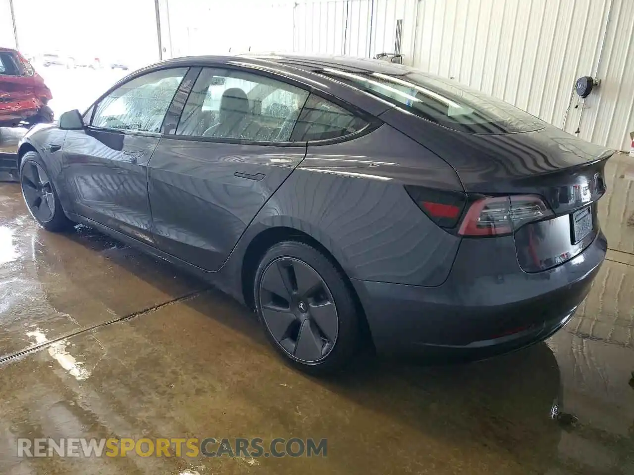 2 Photograph of a damaged car 5YJ3E1EB5MF979696 TESLA MODEL 3 2021
