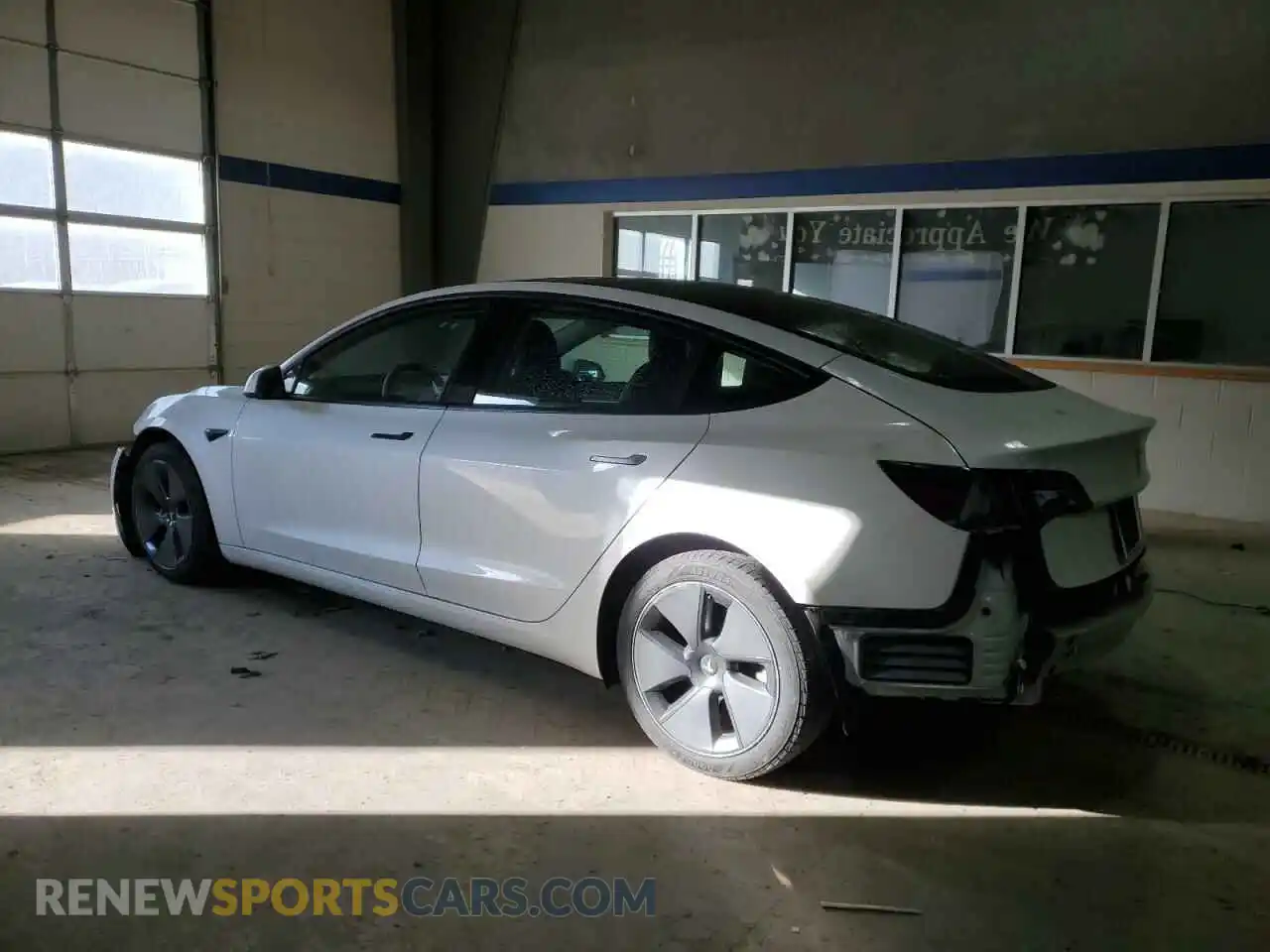 2 Photograph of a damaged car 5YJ3E1EB5MF980055 TESLA MODEL 3 2021