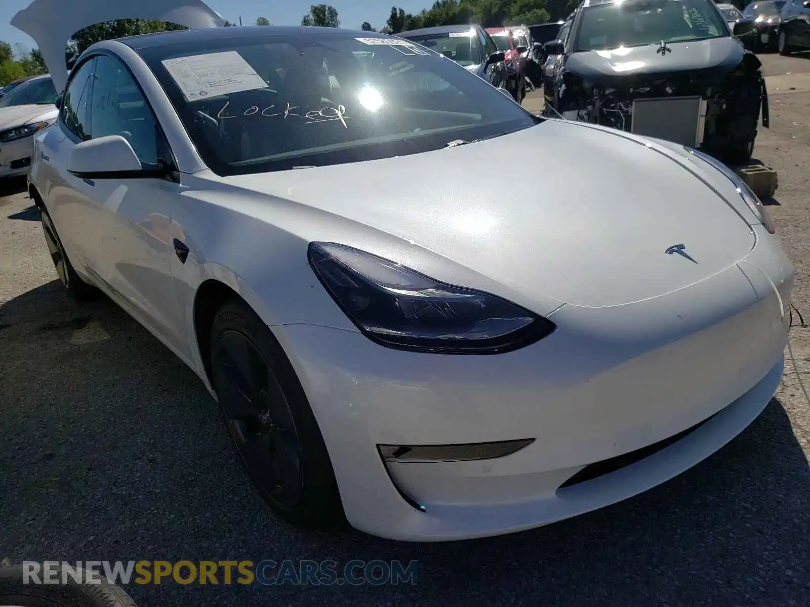 1 Photograph of a damaged car 5YJ3E1EB5MF992755 TESLA MODEL 3 2021