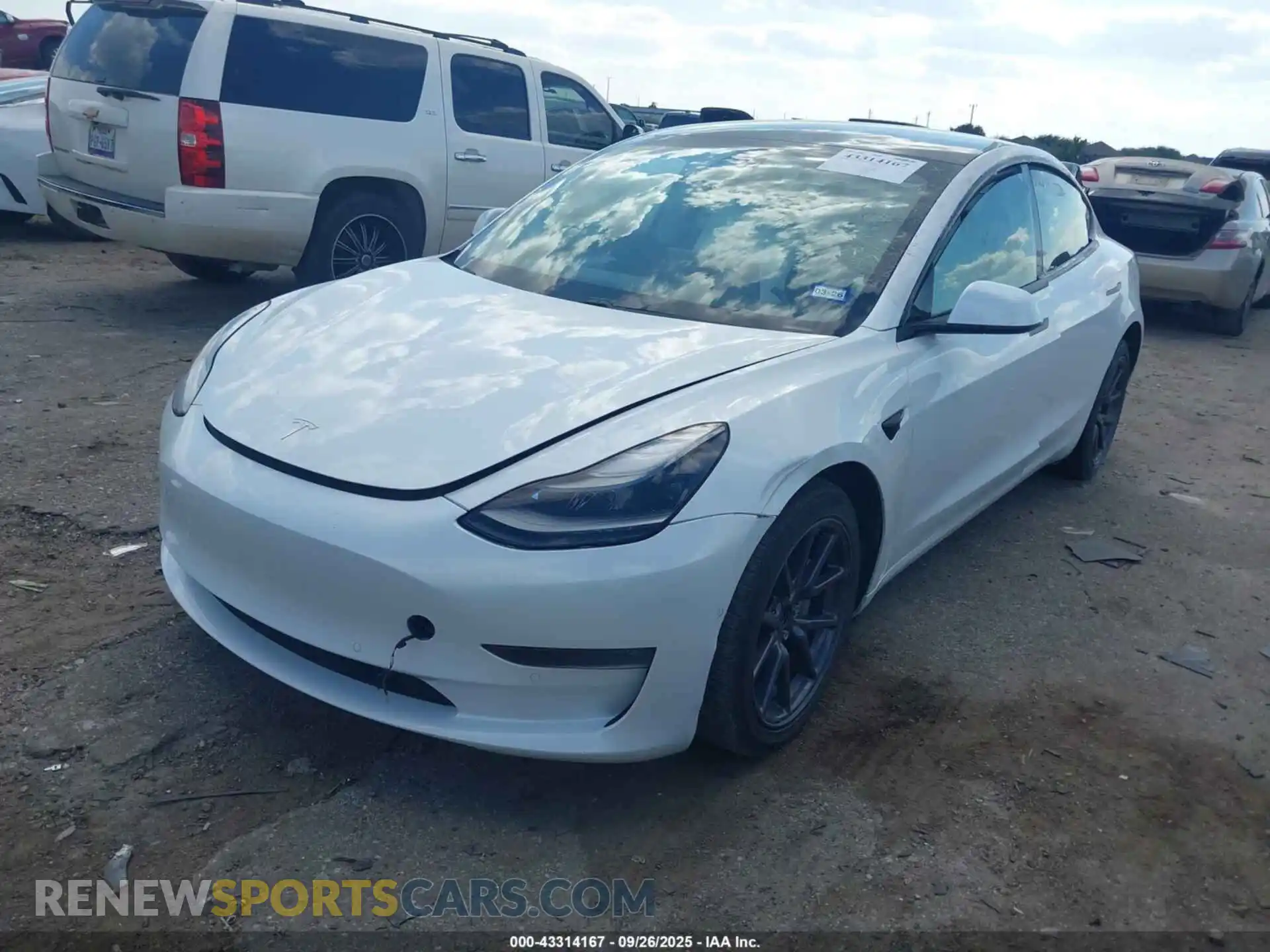 2 Photograph of a damaged car 5YJ3E1EB5MF993033 TESLA MODEL 3 2021