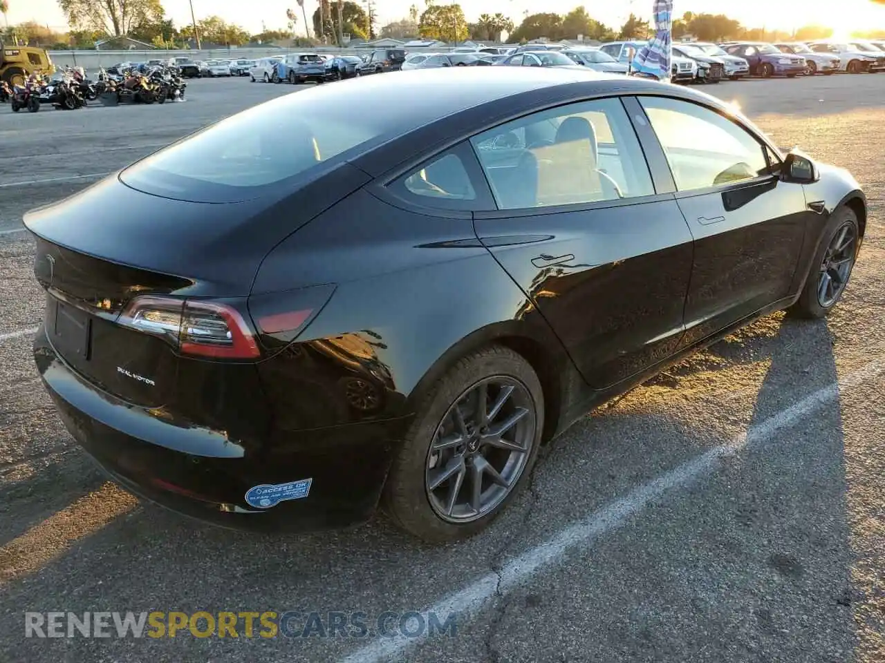 3 Photograph of a damaged car 5YJ3E1EB6MF014782 TESLA MODEL 3 2021