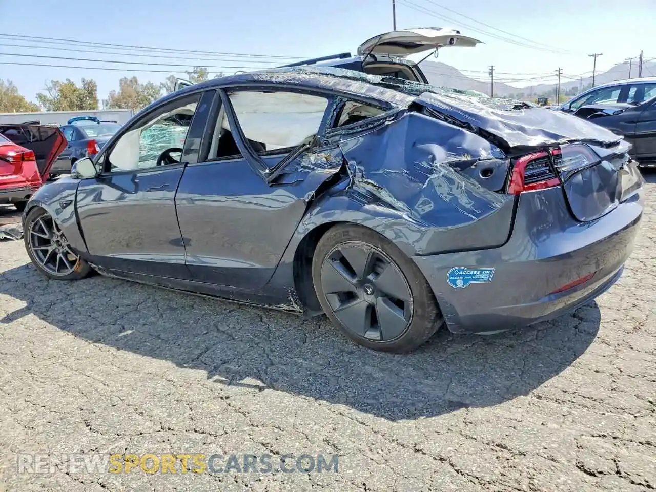 2 fotografías del automóvil dañado 5YJ3E1EB6MF914985 TESLA MODEL 3 2021