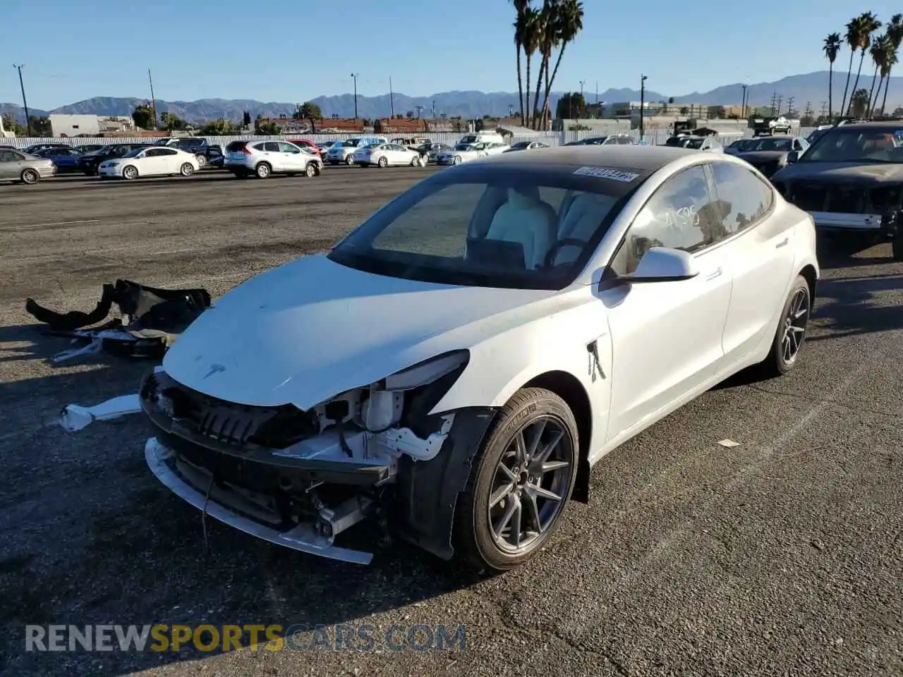 2 Photograph of a damaged car 5YJ3E1EB6MF927025 TESLA MODEL 3 2021