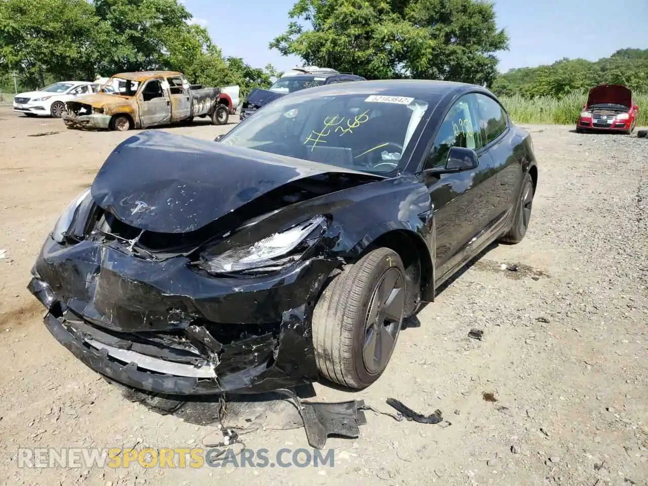 2 Photograph of a damaged car 5YJ3E1EB7MF836698 TESLA MODEL 3 2021