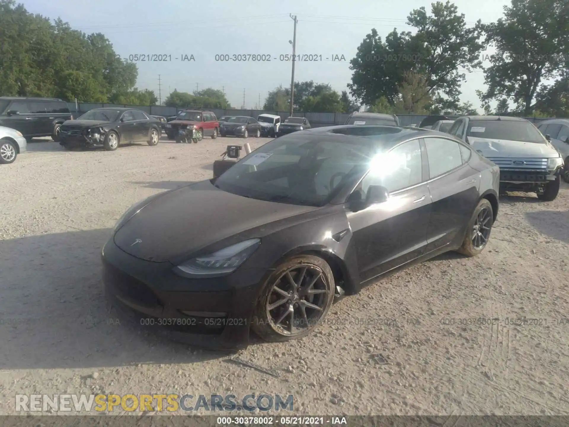 2 Photograph of a damaged car 5YJ3E1EB7MF858474 TESLA MODEL 3 2021