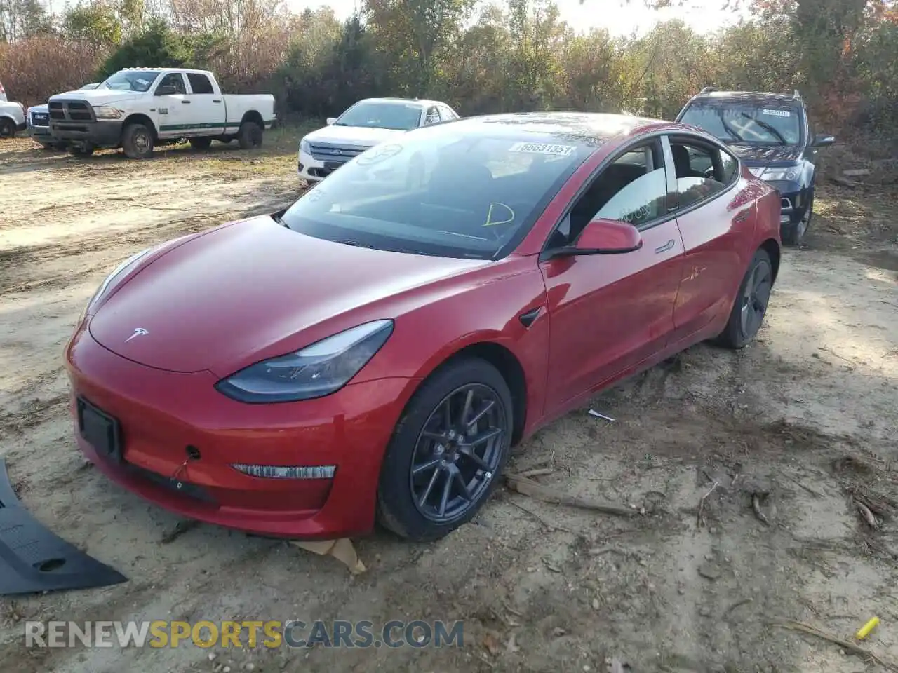 2 fotografías del automóvil dañado 5YJ3E1EB7MF916034 TESLA MODEL 3 2021