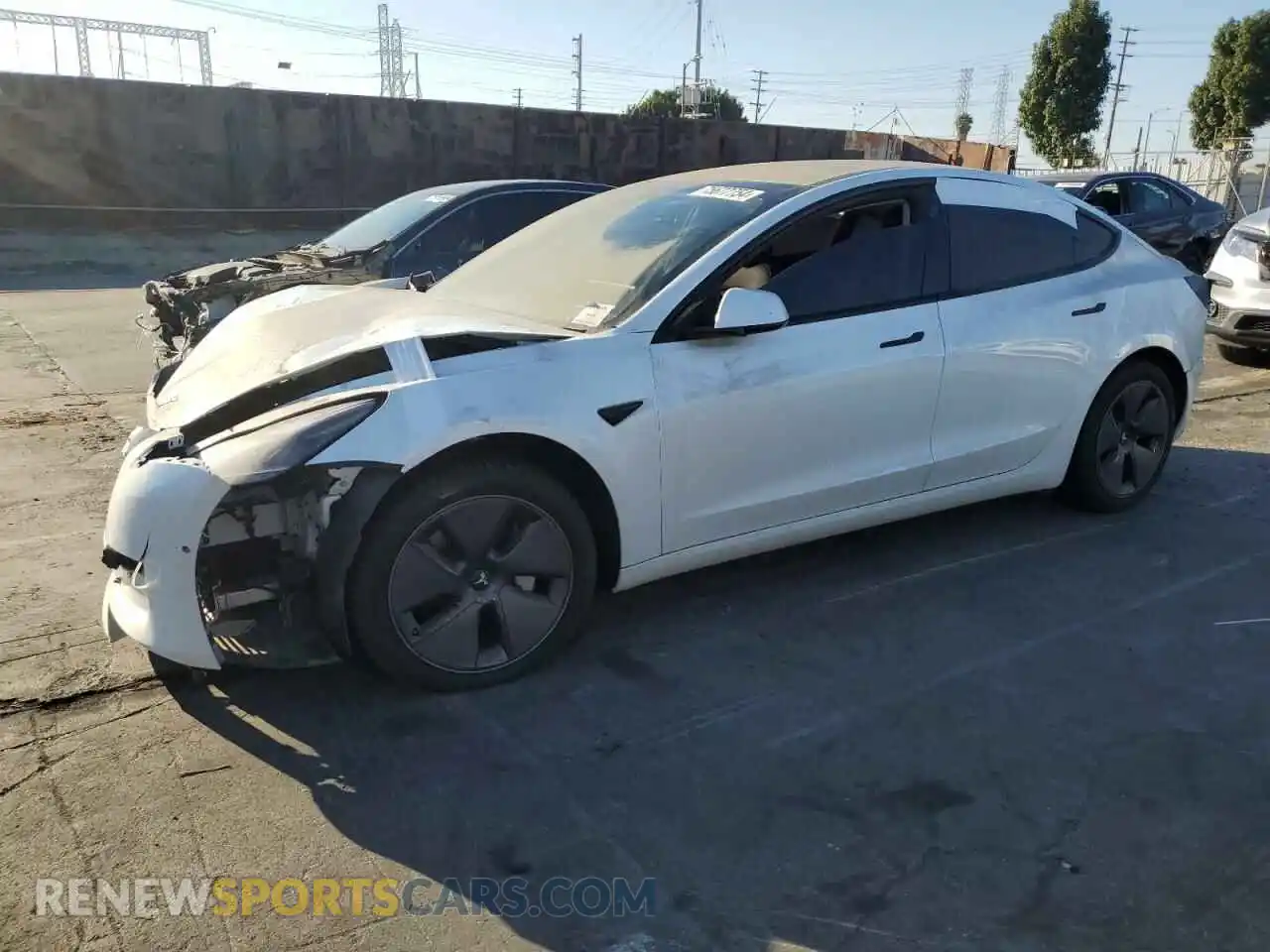 1 Photograph of a damaged car 5YJ3E1EB7MF938082 TESLA MODEL 3 2021