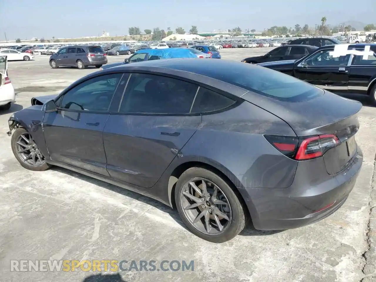 2 Photograph of a damaged car 5YJ3E1EB7MF938468 TESLA MODEL 3 2021