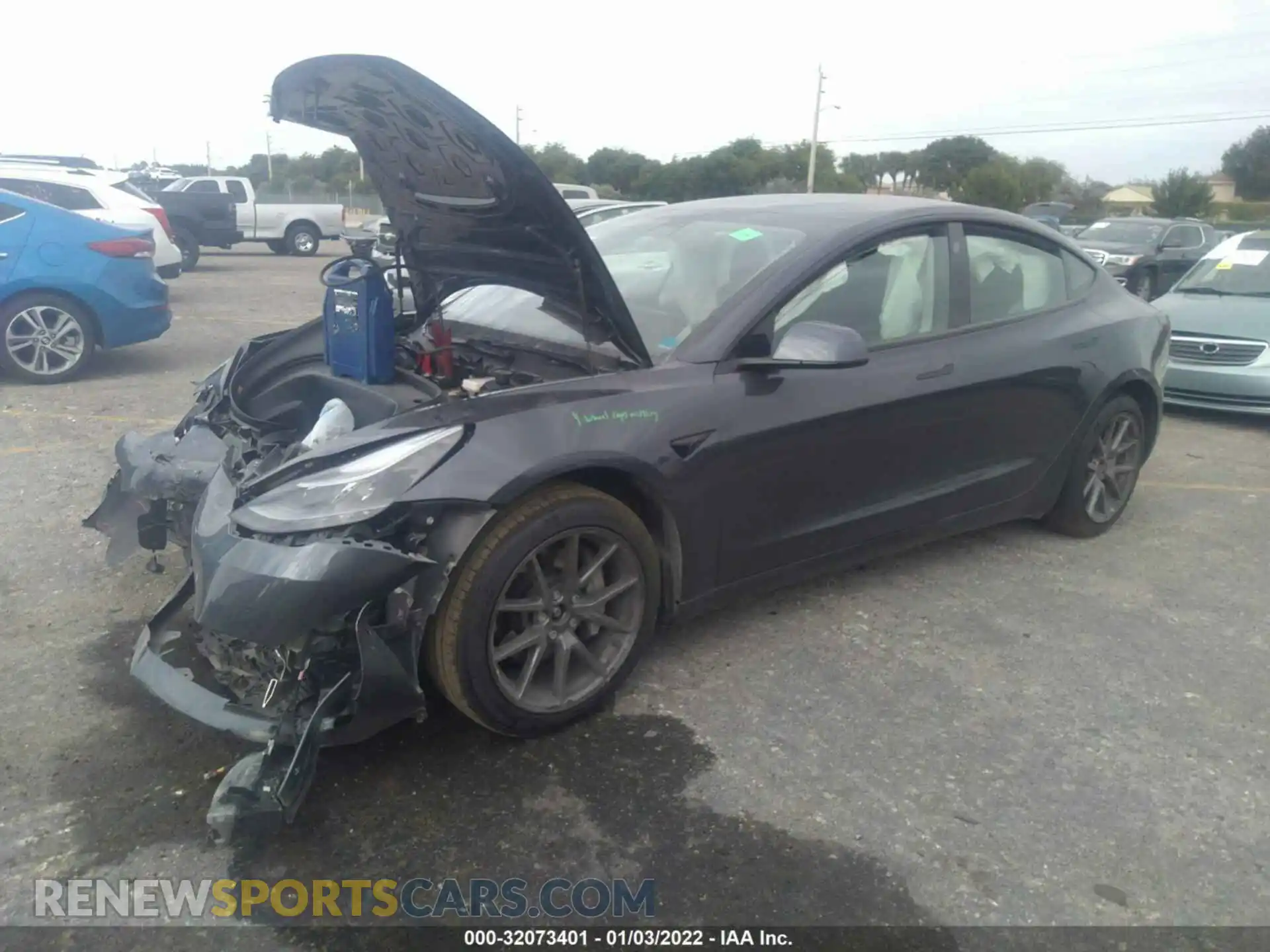 2 Photograph of a damaged car 5YJ3E1EB7MF965475 TESLA MODEL 3 2021