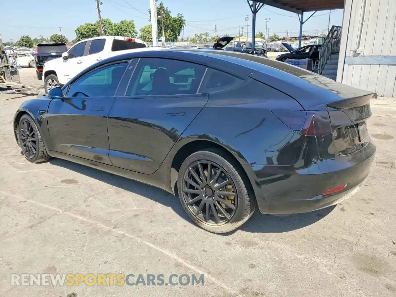 2 Photograph of a damaged car 5YJ3E1EB8MF003606 TESLA MODEL 3 2021
