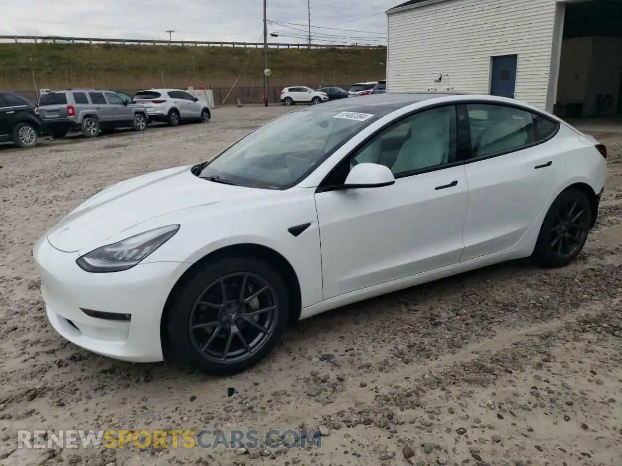 1 Photograph of a damaged car 5YJ3E1EB8MF852831 TESLA MODEL 3 2021