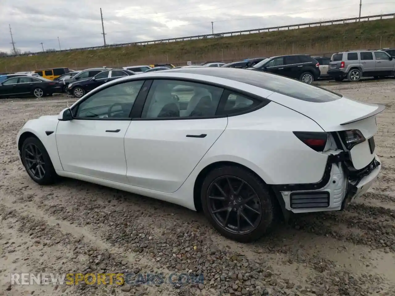 2 Photograph of a damaged car 5YJ3E1EB8MF852831 TESLA MODEL 3 2021