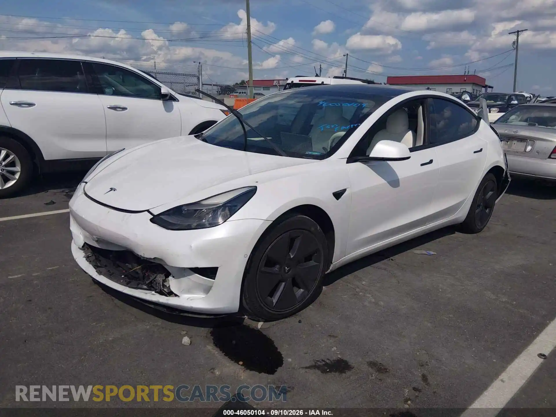2 Photograph of a damaged car 5YJ3E1EB9MF013299 TESLA MODEL 3 2021