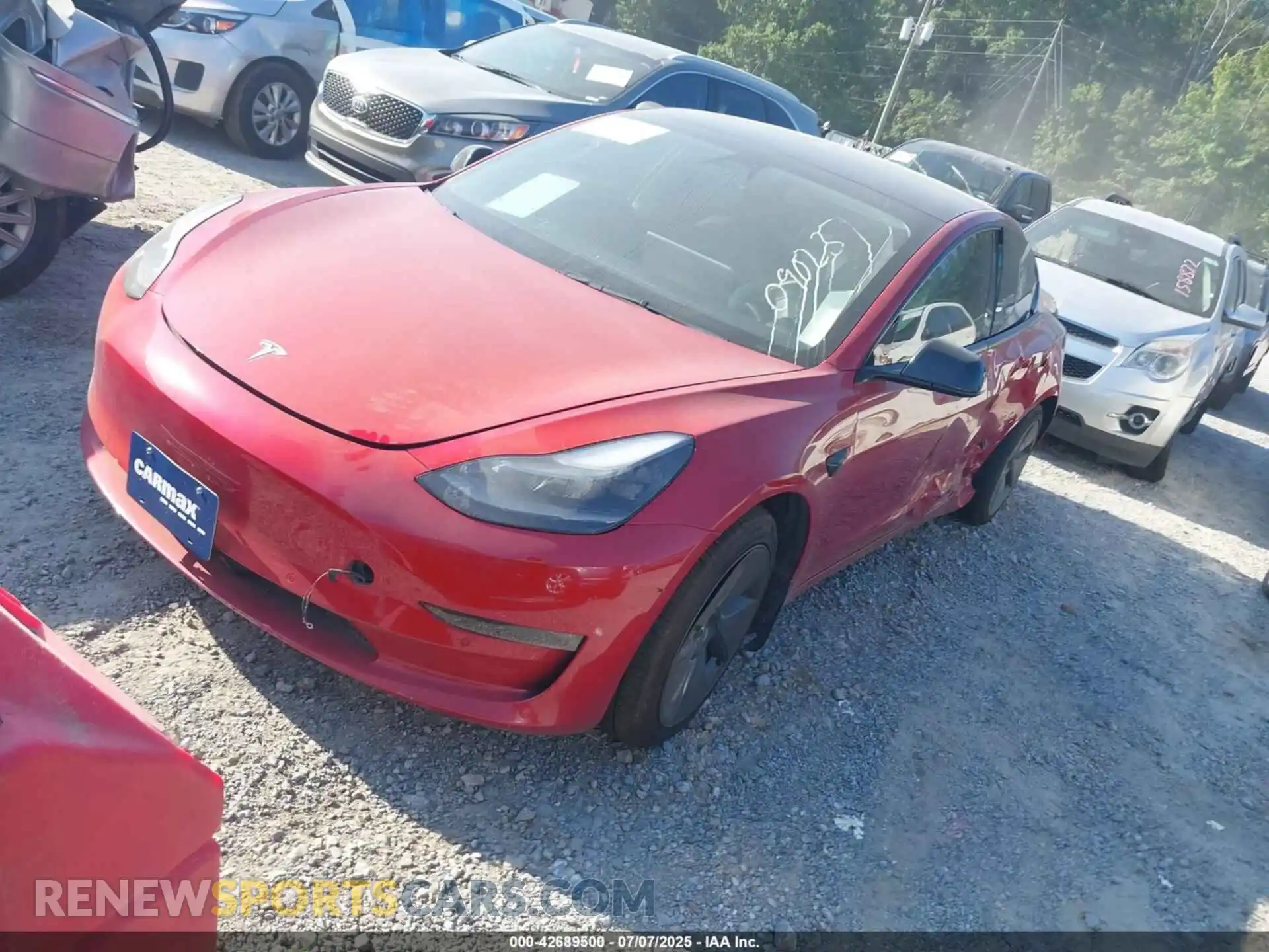 2 Photograph of a damaged car 5YJ3E1EB9MF090237 TESLA MODEL 3 2021