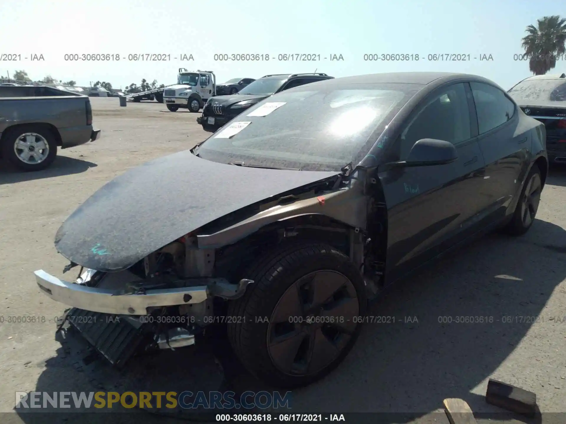 2 Photograph of a damaged car 5YJ3E1EB9MF938441 TESLA MODEL 3 2021