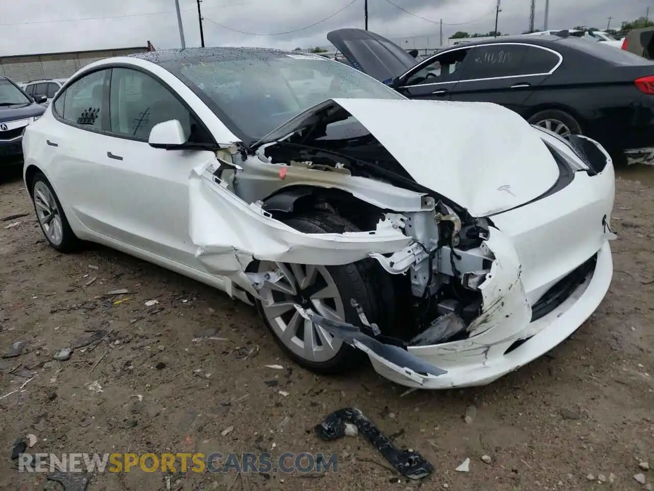 1 Photograph of a damaged car 5YJ3E1EB9MF975327 TESLA MODEL 3 2021