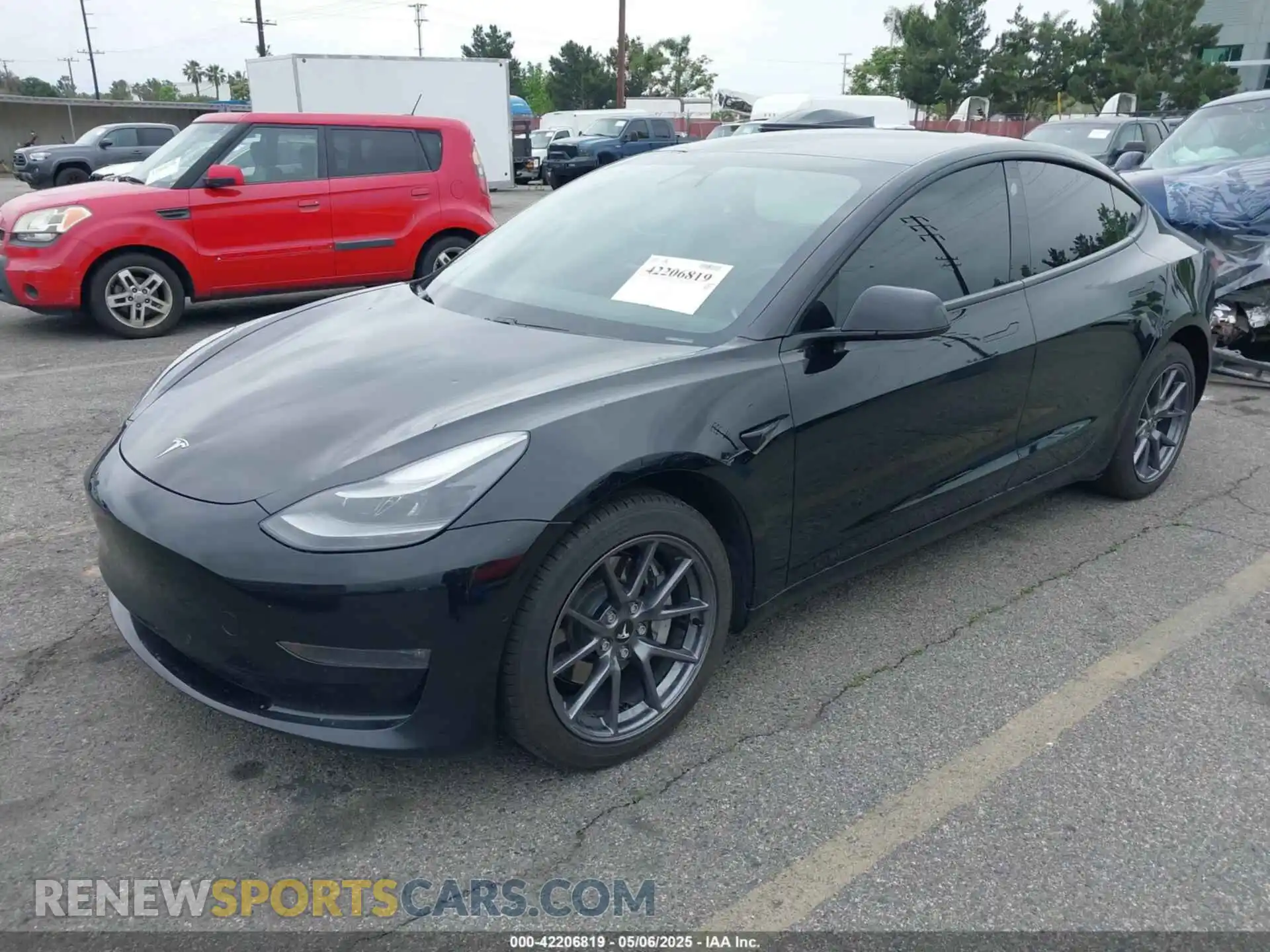 2 Photograph of a damaged car 5YJ3E1EBXMF050068 TESLA MODEL 3 2021