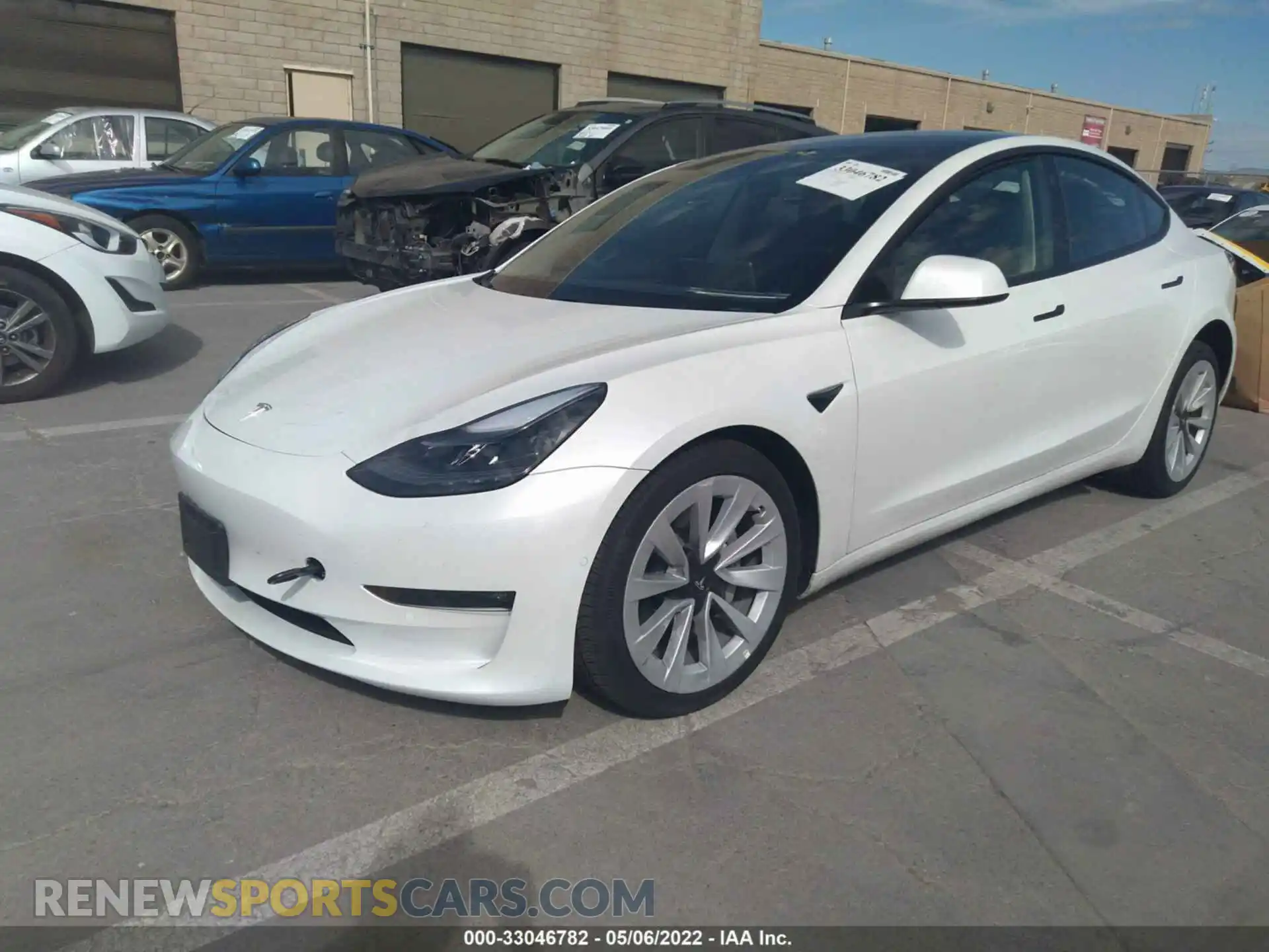 2 fotografías del automóvil dañado 5YJ3E1EBXMF071180 TESLA MODEL 3 2021