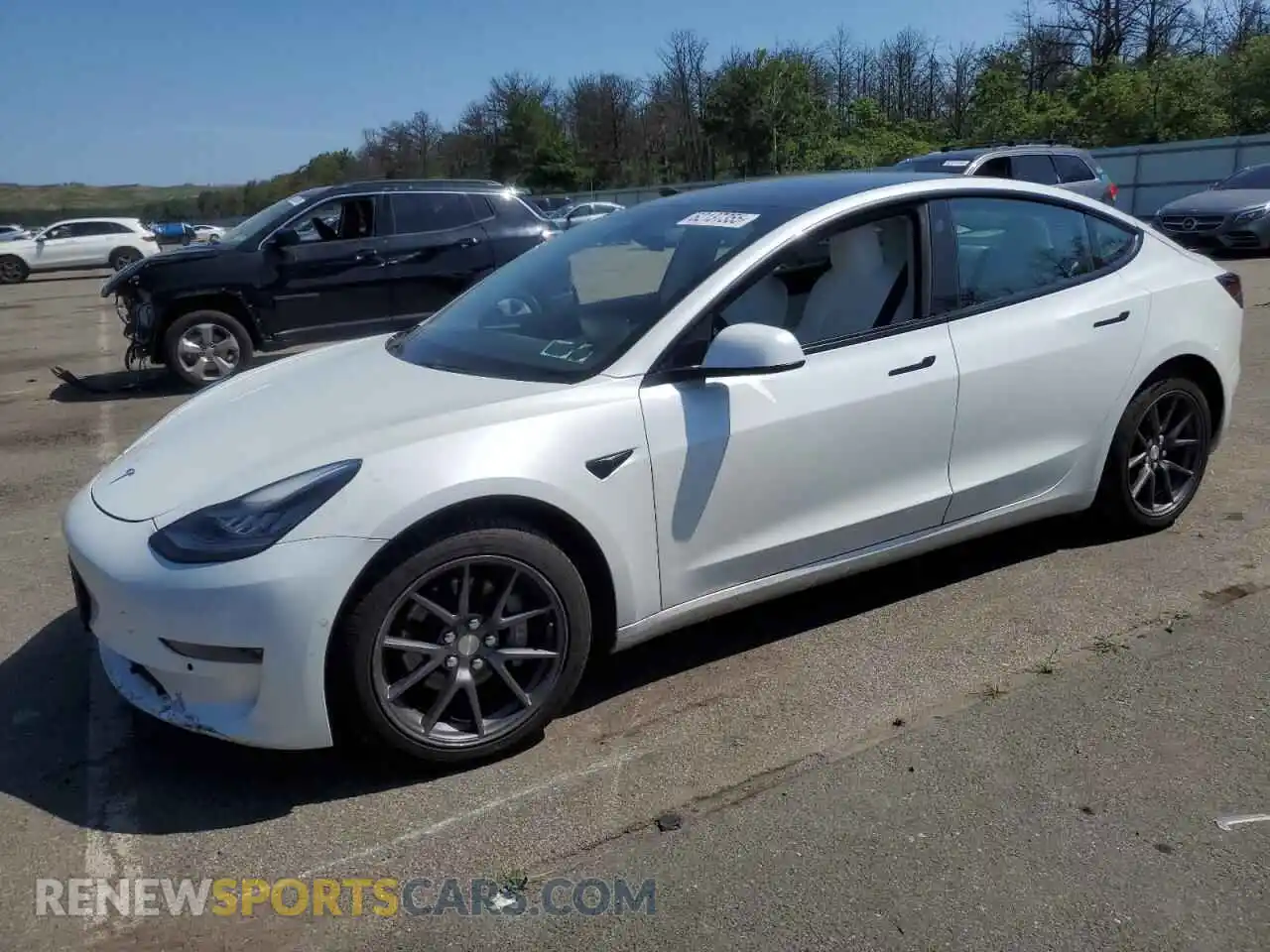 1 Photograph of a damaged car 5YJ3E1EBXMF858582 TESLA MODEL 3 2021