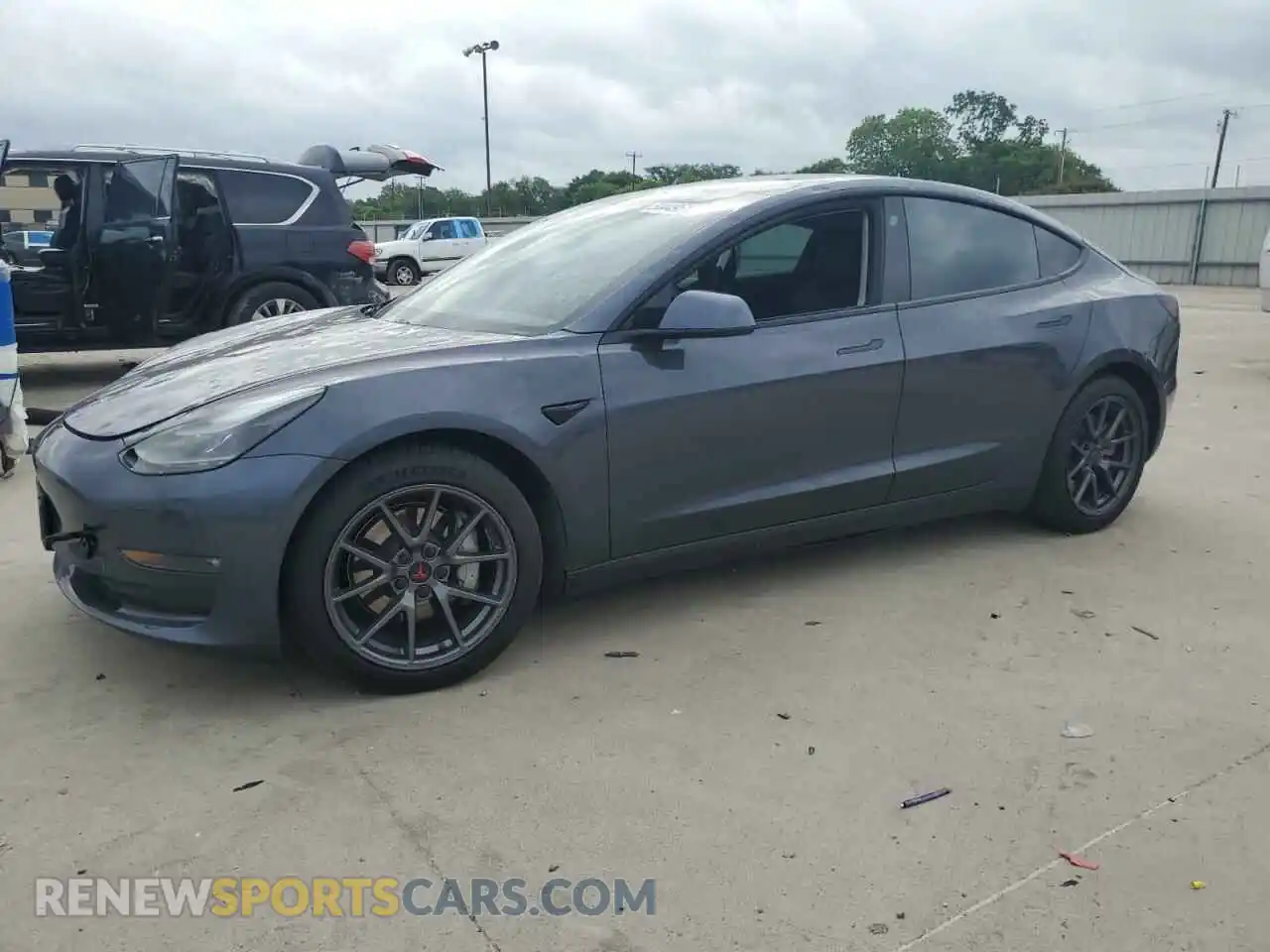 1 Photograph of a damaged car 5YJ3E1EBXMF869307 TESLA MODEL 3 2021