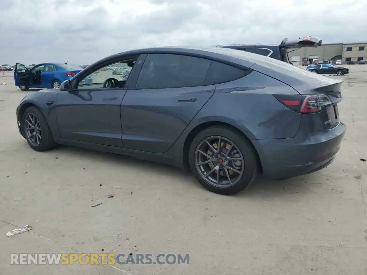 2 Photograph of a damaged car 5YJ3E1EBXMF869307 TESLA MODEL 3 2021