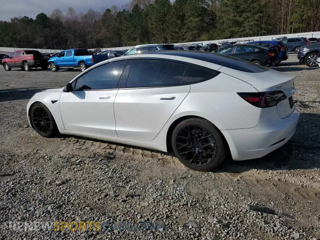 2 Photograph of a damaged car 5YJ3E1EBXMF869730 TESLA MODEL 3 2021