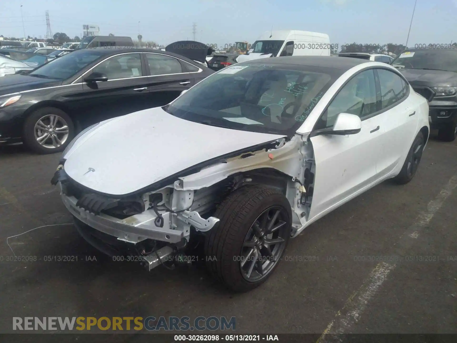 2 Photograph of a damaged car 5YJ3E1EBXMF876208 TESLA MODEL 3 2021