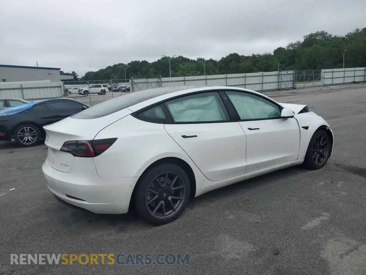 3 Photograph of a damaged car 5YJ3E1EBXMF983453 TESLA MODEL 3 2021