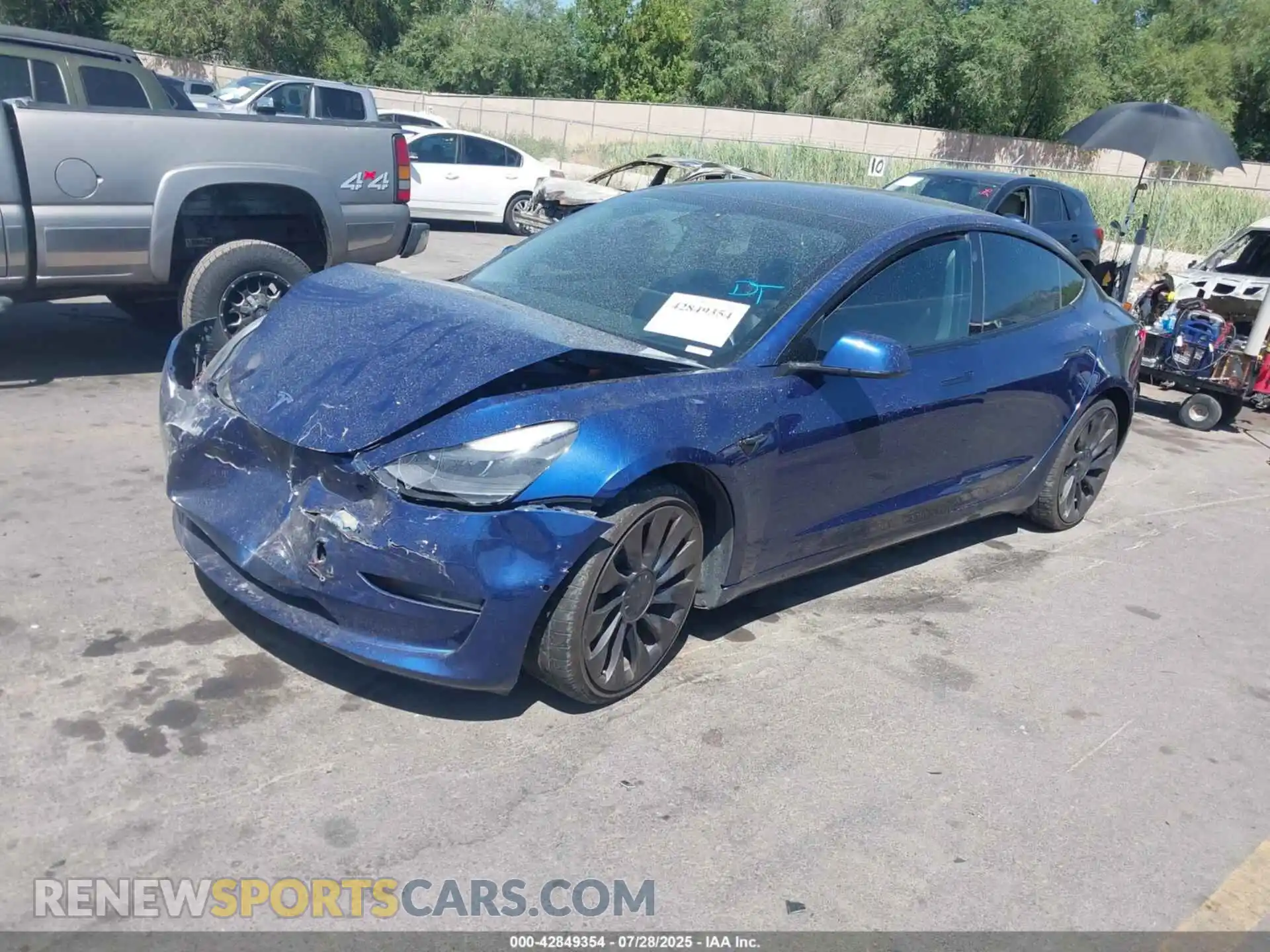 2 Photograph of a damaged car 5YJ3E1EC0MF925358 TESLA MODEL 3 2021