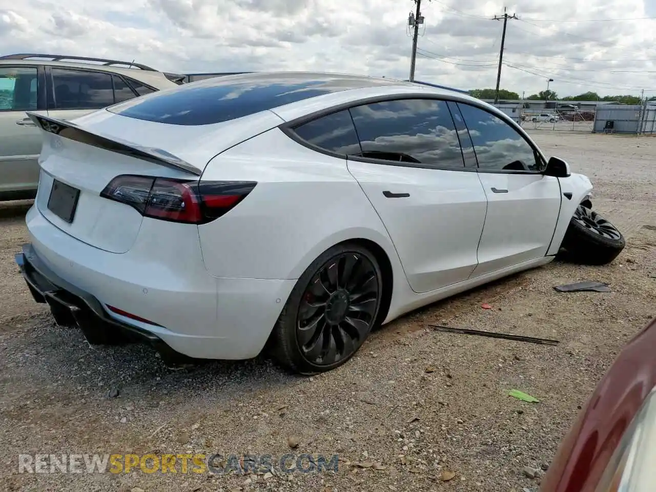 3 Photograph of a damaged car 5YJ3E1EC0MF985057 TESLA MODEL 3 2021