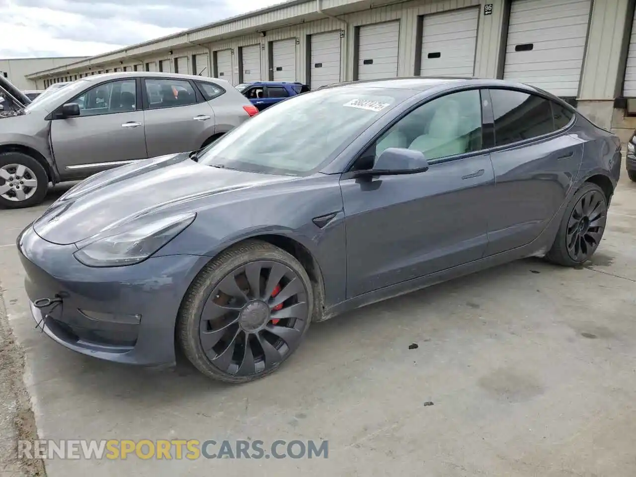 1 Photograph of a damaged car 5YJ3E1EC0MF995698 TESLA MODEL 3 2021