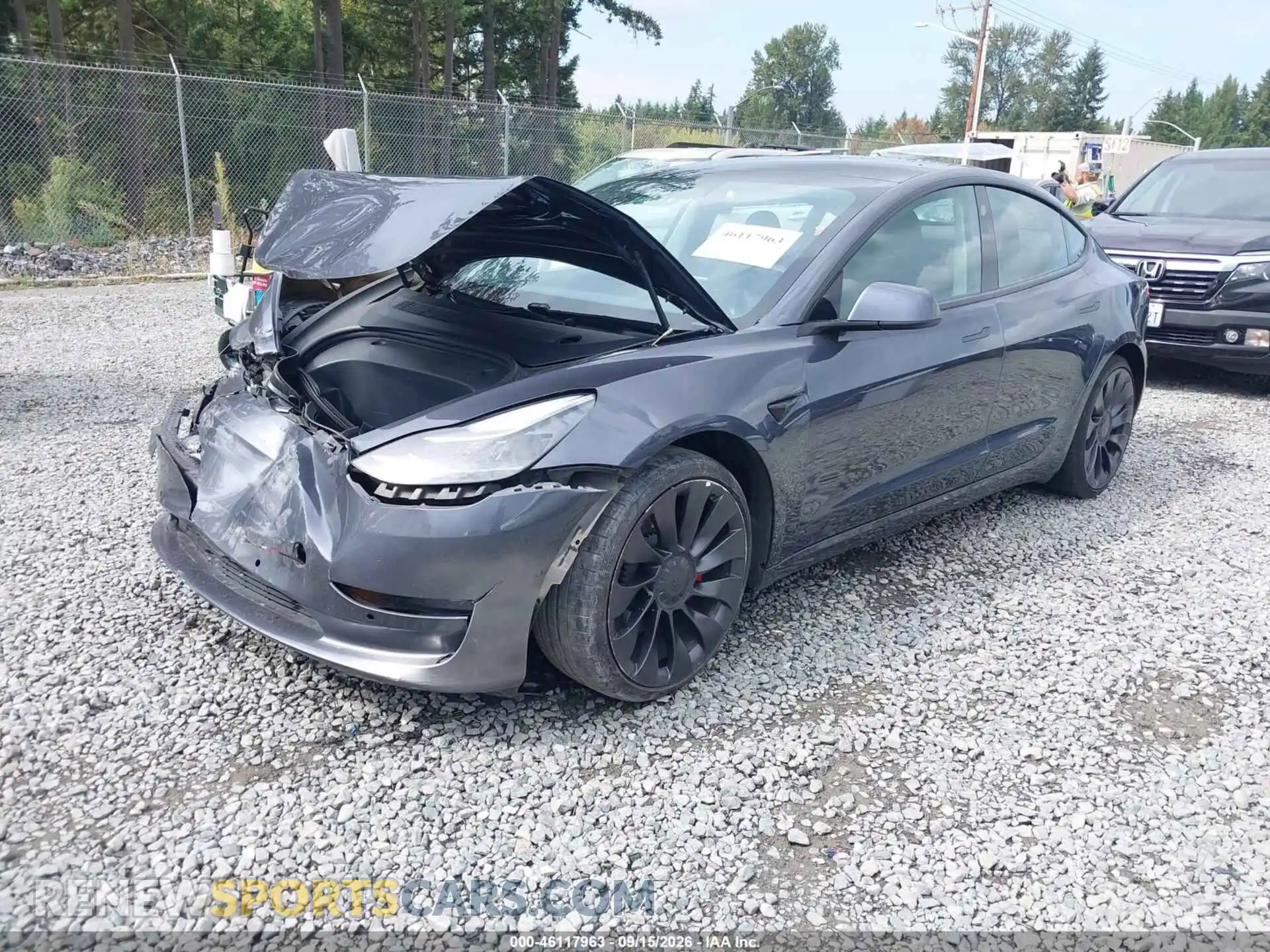 2 fotografías del automóvil dañado 5YJ3E1EC1MF926051 TESLA MODEL 3 2021