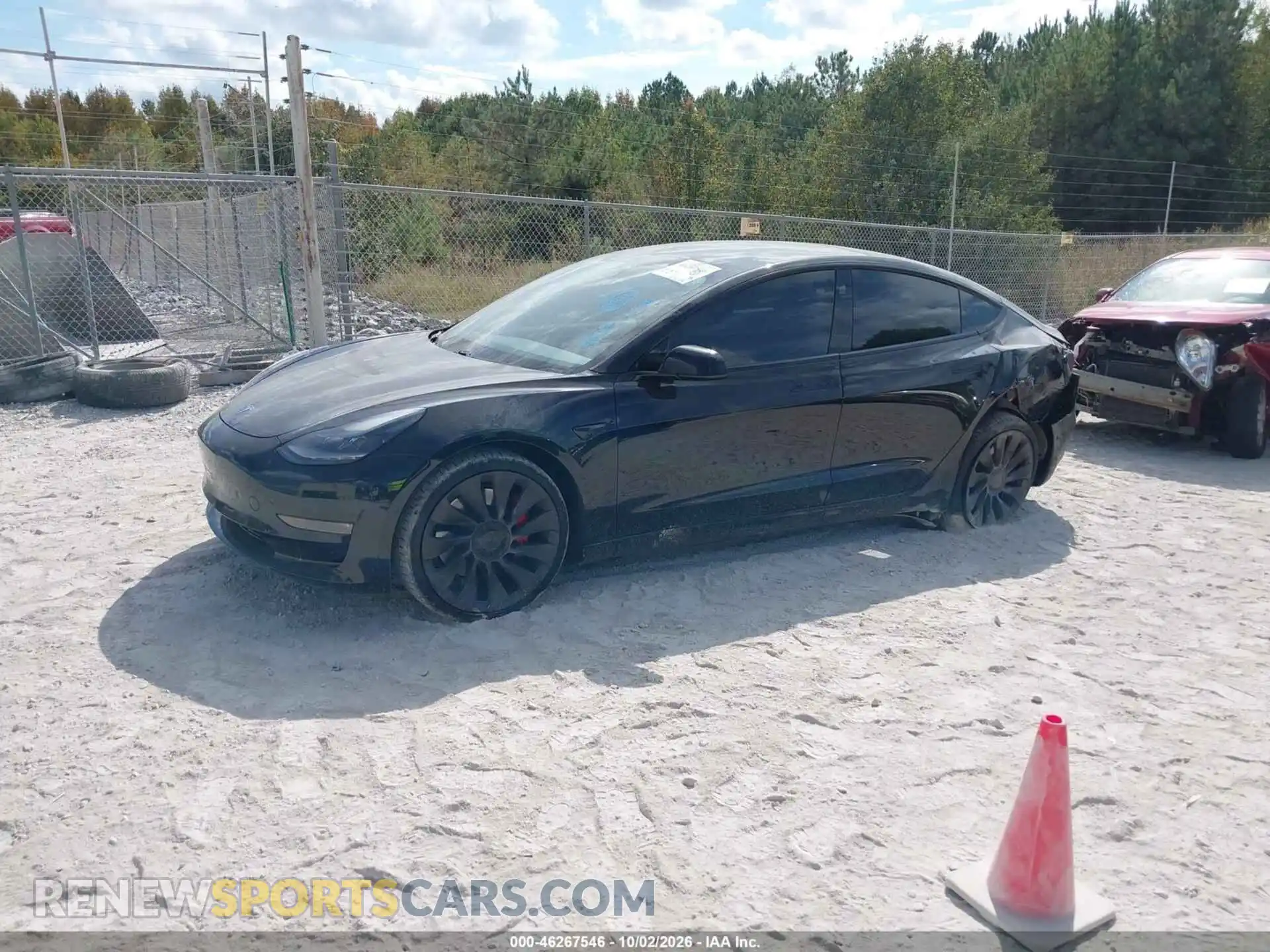 2 Photograph of a damaged car 5YJ3E1EC1MF990879 TESLA MODEL 3 2021