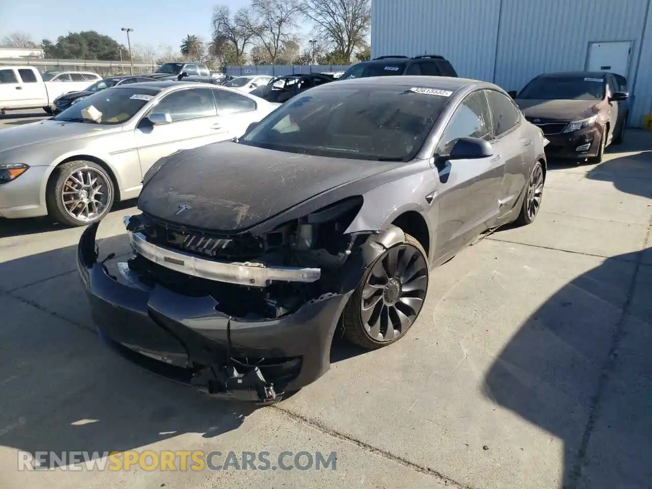 2 Photograph of a damaged car 5YJ3E1EC2MF001665 TESLA MODEL 3 2021