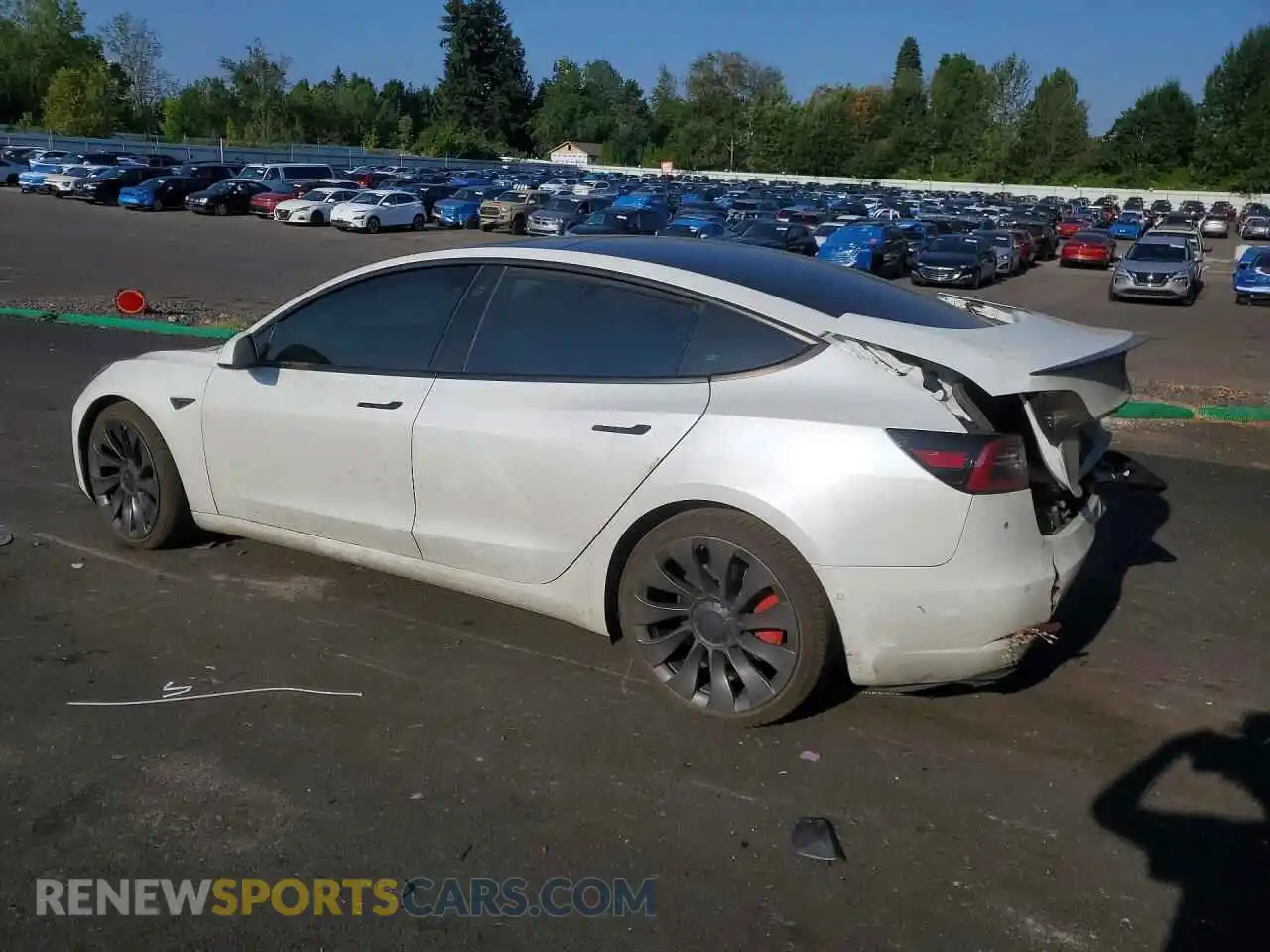 2 Photograph of a damaged car 5YJ3E1EC2MF850887 TESLA MODEL 3 2021
