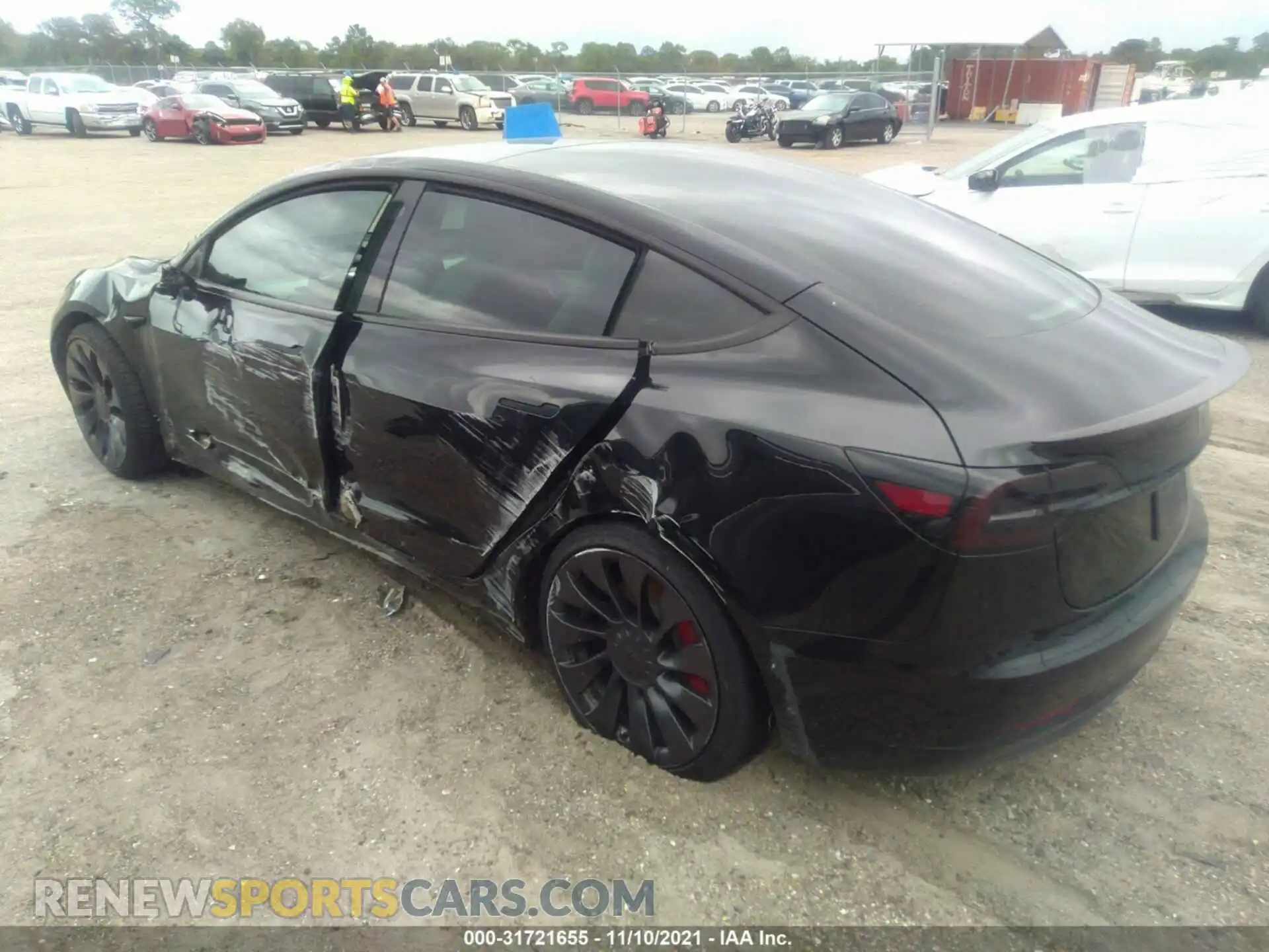 3 Photograph of a damaged car 5YJ3E1EC2MF913552 TESLA MODEL 3 2021