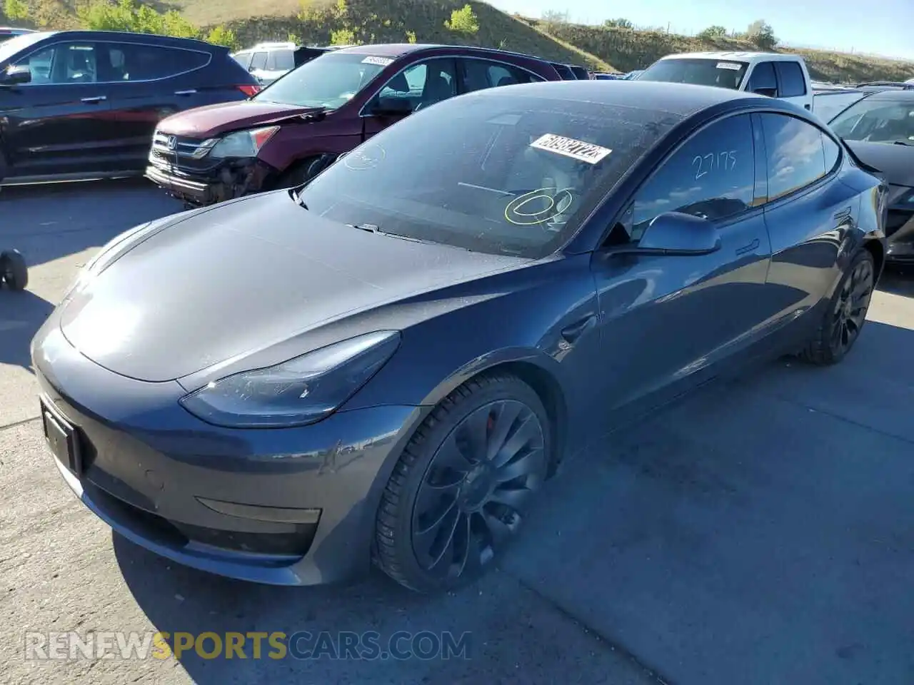 2 Photograph of a damaged car 5YJ3E1EC2MF975565 TESLA MODEL 3 2021